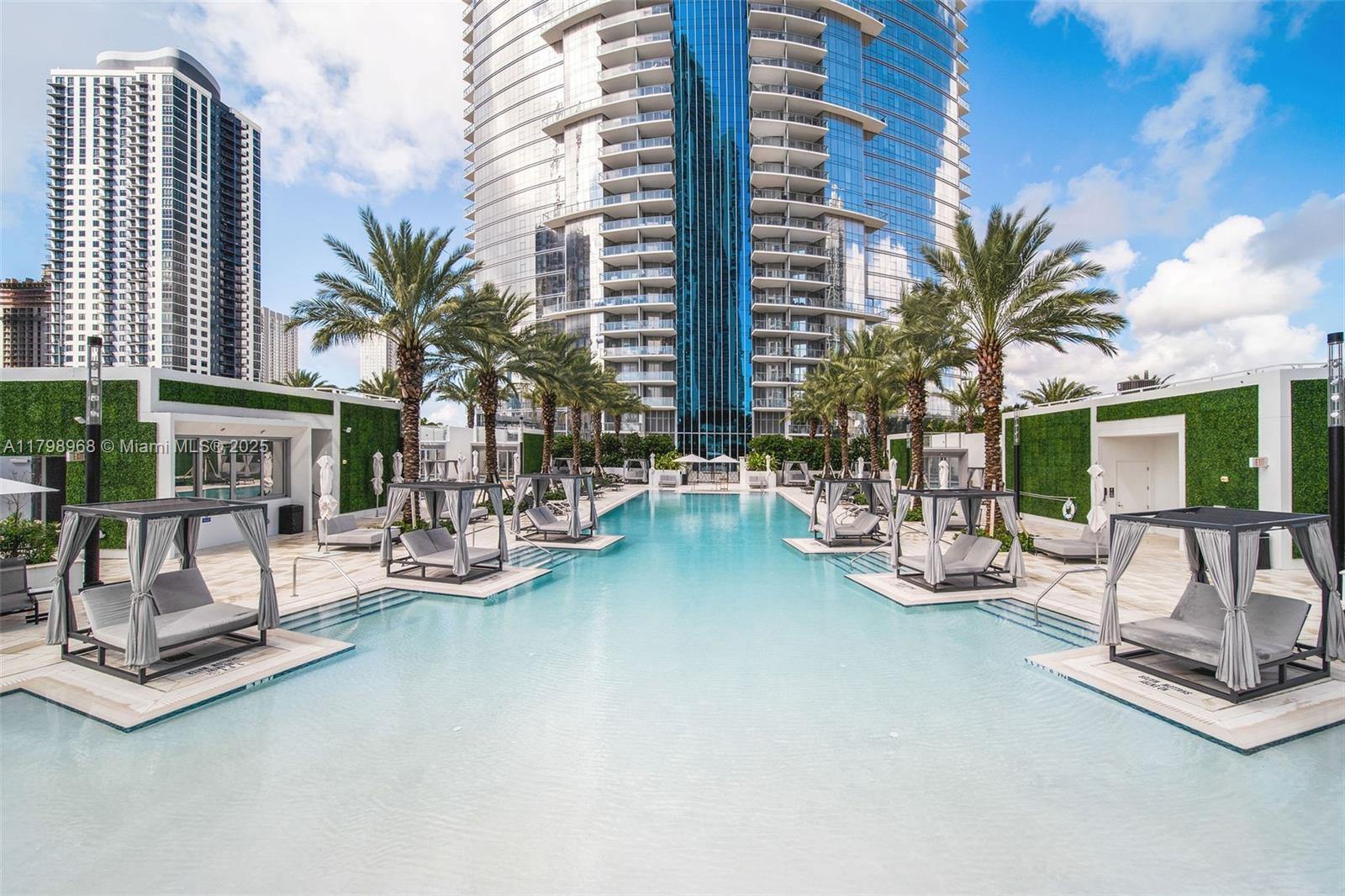 Discover unparalleled city living with this stunning, fully furnished 1-Bed + den, 2-Bath apartment in the iconic Paramount Miami Worldcenter. Soaring above the skyline, this residence offers modern elegance & unmatched comfort. Indulge in a lifestyle of luxury with access to virtual golf, five resort-style pools, yoga studio, state-of-the-art fitness center with boxing area, basketball & tennis courts, racquetball, children's play area, sky deck, outdoor BBQs, and an in-house market for all your essentials. Close distance to world-class shopping, dining, & entertainment. The apartment's central location puts you minutes from I-95, Miami International Airport, Brickell, Wynwood, and Miami Beach. With train stations just a few blocks away, walkability & connectivity couldn't be easier.