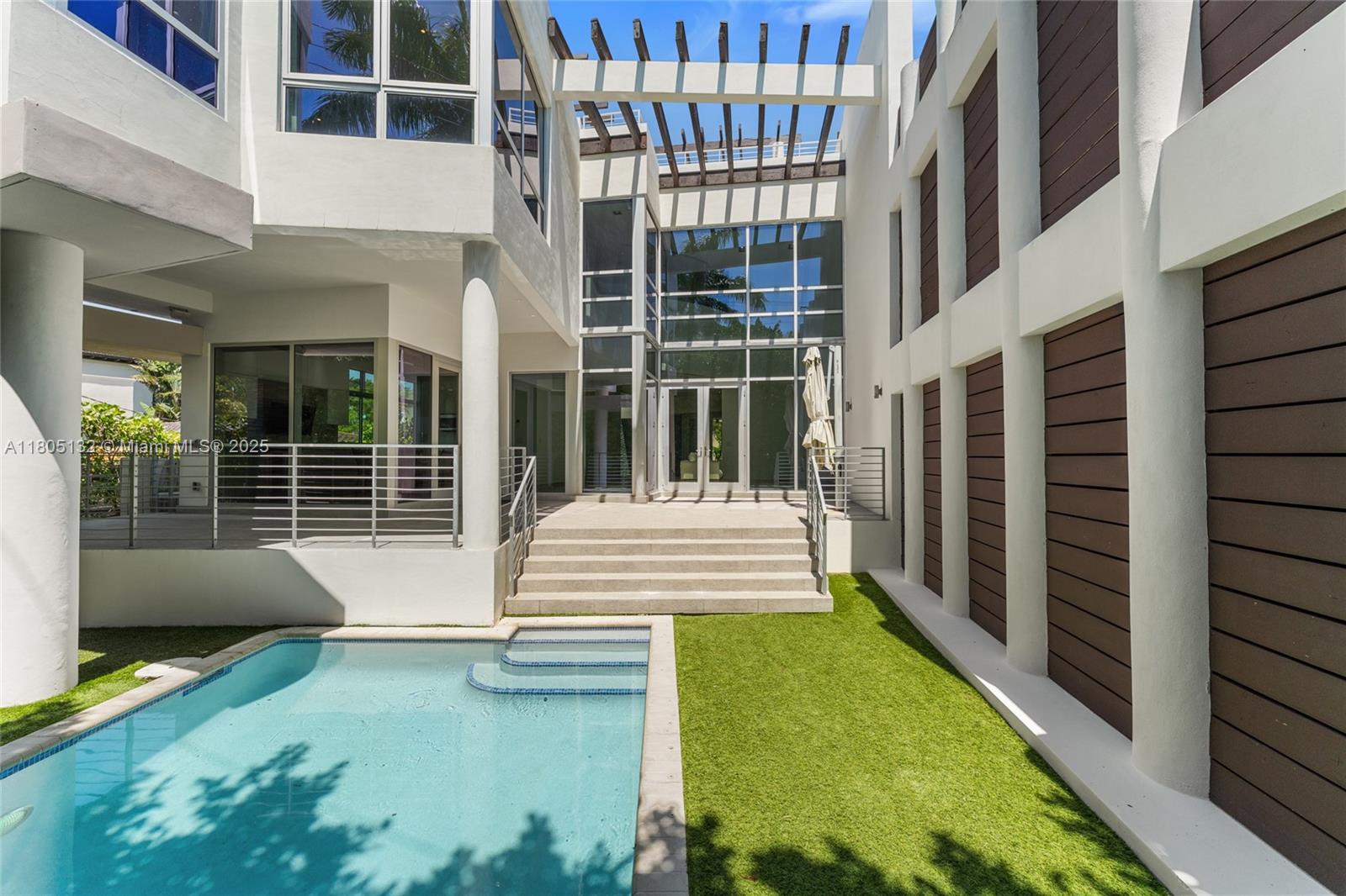 Fully Furnished 4-Bedroom Home in the Heart of Key Biscayne. NO ASSOCIATION! Perfect island getaway! This stylish modern 4-bedroom, 3-bathroom house in Key Biscayne has it all. Sleek design, big windows, and tons of natural light, the home feels open, bright, and welcoming. It comes fully furnished, so you can move right in and start enjoying the good life. There's a private pool, a rooftop patio for lounging or entertaining, and yes — even an elevator that makes moving between floors a breeze. The location couldn't be better. You're just a short walk or bike ride from the beach, parks, shops, and restaurants - everything Key Biscayne has to offer is right around the corner. Whether you're looking for a full-time home or a vacation escape, this place is move-in ready and waiting for you.