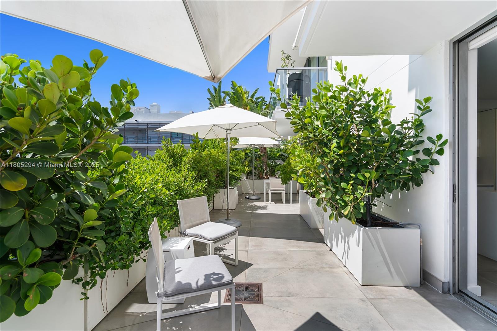 Experience elevated living at its finest in this exquisite condo in Miami Beach, FL. This highrise residence offers a perfect blend of luxury and comfort, with 1,334 SqFt of thoughtfully designed space. Featuring 2 spacious bed & 2.5 baths. The layout is ideal for both relaxation & entertaining. Step into a beautifully appointed interior that exudes sophistication & style. The open-concept living area is designed to maximize space and functionality, creating an inviting atmosphere for residents & guests alike. 10 Ft kitchen island, 500 SqFt terrace w/ custom planters & irrigation system, custom doors, motorized shades and porcelain tiles. Enjoy a suite of premium amenities that extend your living space with a heated pool & much more. Furnishings available to purchase.