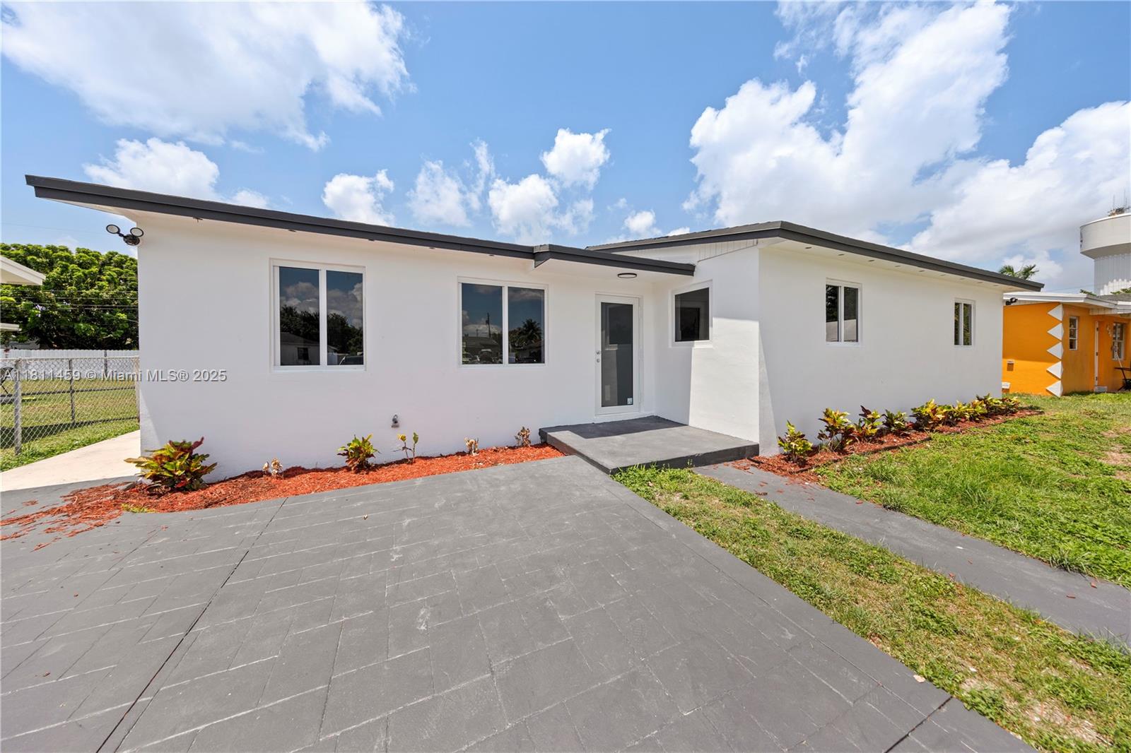 Brand new roof and impact windows and doors, tile floors through out and updated kitchen and bathrooms. Must see home with a huge lot and and concrete stamped drive way with room for the whole family. Few blocks to downtown homestead and parks. Seller willing to pay some closing cost. Prefered lender can also contribute $5k. LOW TAXES NO FLOOD Insurance! Rear access for large boats, Rvs and trailers.