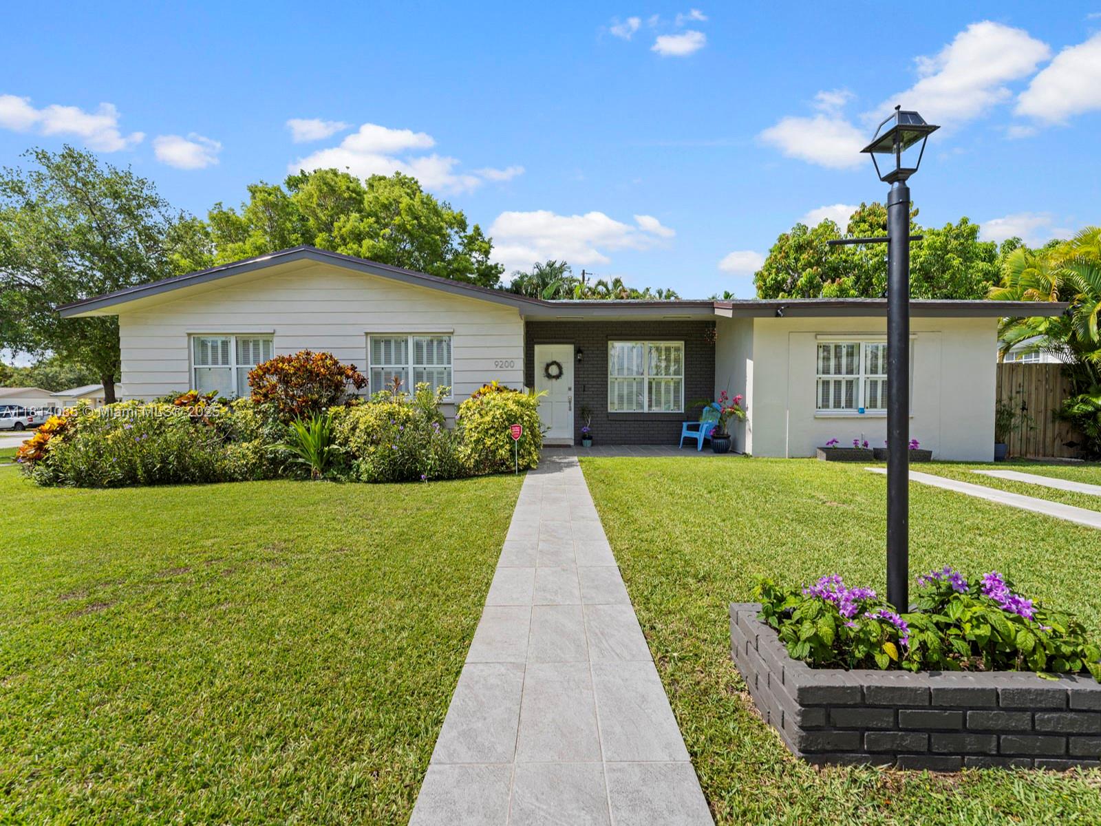 Welcome to this completely updated single-family home, located on a spacious 10,026 sqft. corner lot in the desirable community of Palmetto Bay. Roof completed in 2025. This move-in-ready home offers 1,741 sqft. of living space, 3 bed & 2 bath, perfectly blending comfort, style, and functionality. Inside you'll find a modern layout, featuring a fully renovated kitchen w/ sleek countertops, tastefully remodeled bathrooms, updated flooring, plumbing and elegant plantation shutters throughout. The backyard is your personal oasis, offering an attached pergola for shade and a pool, it's perfect for entertaining or relaxing year-round. Just a short walk away, Palmetto Bay Park will offer a new skate park, dog park and indoor gym. Storage Shed will convey.