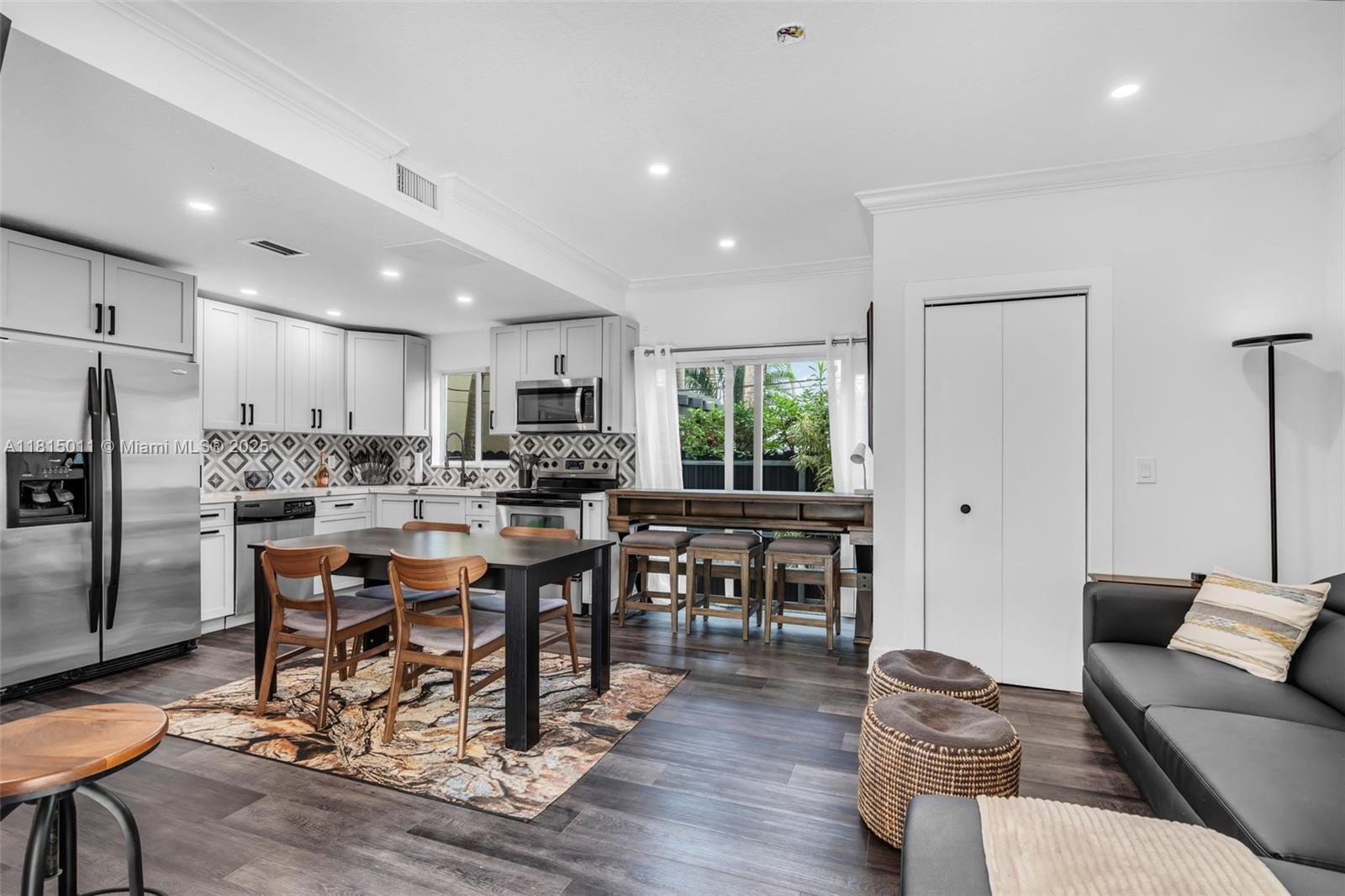 Completely renovated unit in the heart of Coconut Grove. No restrictions, daily rentals allowed. Cozy two bedroom/two bathroom unit within walking distance to Cocowalk (4 blocks). Located on the first floor.  Two covered parking spaces, impact windows and doors. Roof is two years old, newer A/C. Only two units in total. Experience this amazing dog friendly neighborhood that offers plenty of parks, restaurants and retail stores.