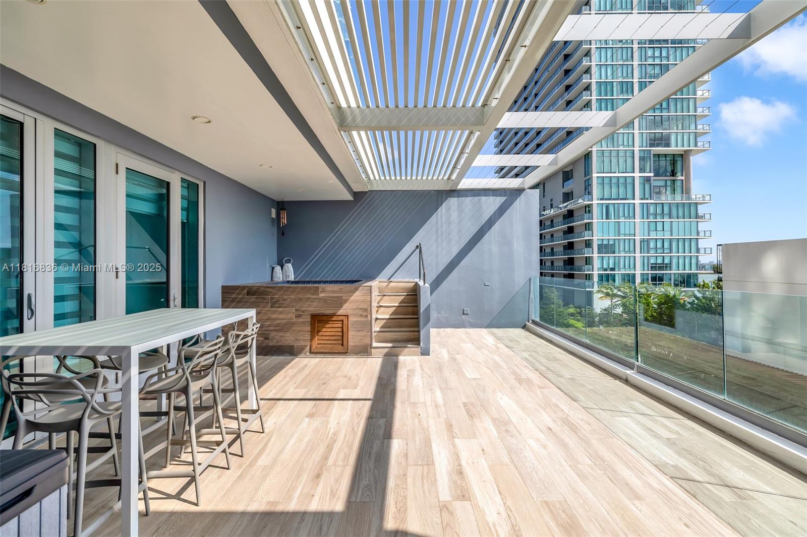 Professionally Designed & Fully Furnished. Stunning Ultra-Contemporary Bay Home Townhouse combining single-family living with resort style amenities. This 4-story Bay Home features top of the line appliances with luxury finishes, floor-to-ceiling windows, an interior private elevator, beautiful porcelain floors throughout, scenic bay views from every room, fitness/media room, a spectacular rooftop terrace overlooking the bay, and more. Enjoy the best amenities in Miami, including a 100 ft diameter pool, state of the art gym, spa, sauna, steam room, private screening room, wine cellar and tasting salon, cigar lounge, outdoor grill, game room with multimedia facilities, bowling alley, tennis courts, and Bayfront Beach club with famed AMARA Restaurant by Award-winning Chef Michael Swchartz.