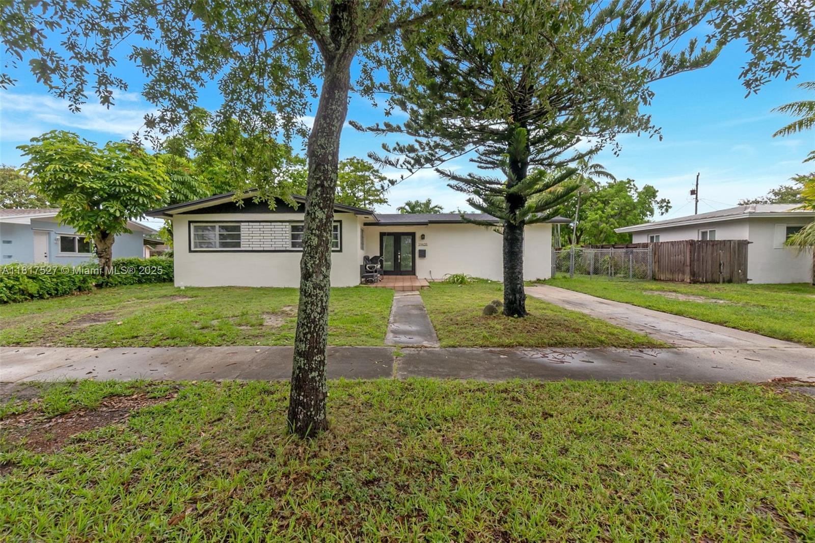 Come see this inviting home located in the beautiful community of Pine Tree Manor in Miami. This property offers 3 bedrooms and 3 bathrooms, with the family room currently being used as a 4th bedroom. Enjoy a remodeled kitchen and updated bathrooms, all featuring neutral tile flooring throughout. The roof is just a year and a half old, and the home includes hurricane panels for added peace of mind. Outdoors, you’ll find a spacious fenced-in backyard with plenty of room for a pool, plus a legal workshop for added convenience. Centrally located near major highways, shopping, and dining.