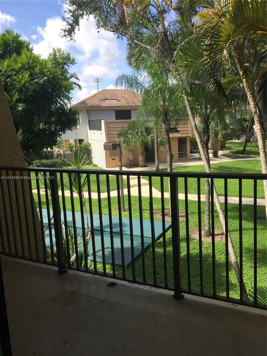 2 bedroom 1 1/2 bath, parking, pool, barbecue area, tennis court, and balcony.