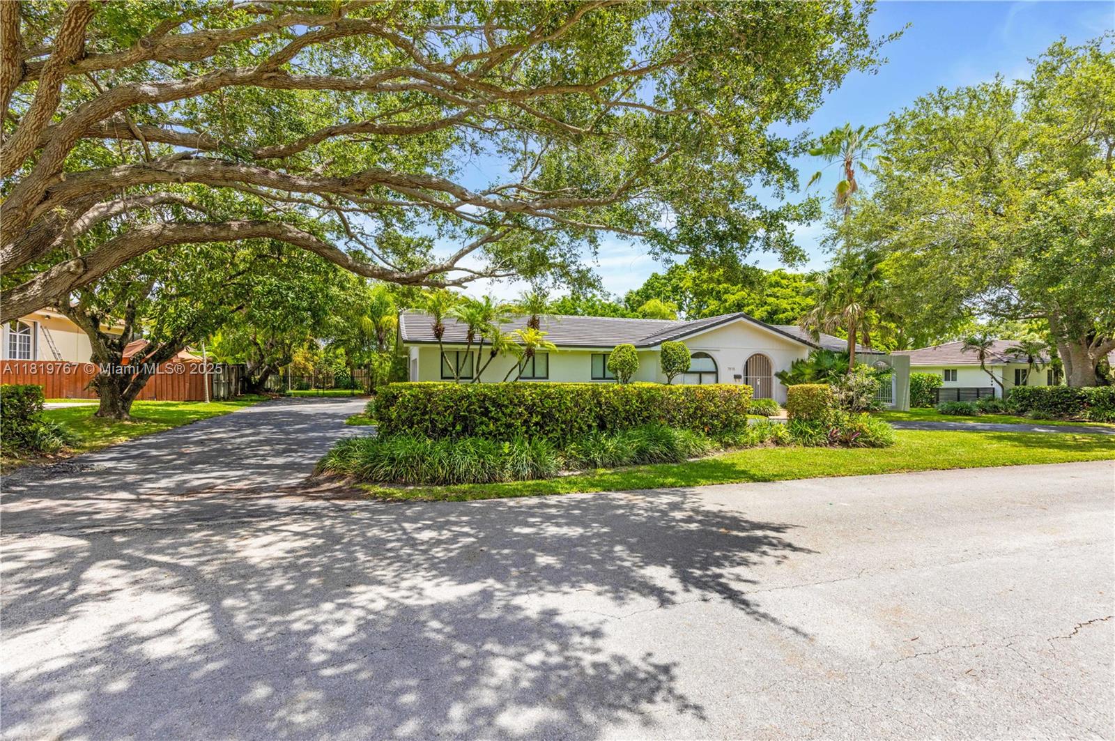 This fully renovated home features 4 bedrooms, 3 bathrooms, a spacious kitchen with a breakfast nook, brand-new stainless appliances, custom built-in cabinets, porcelain tile flooring. The remodeled bathrooms complement the expansive family room, along with formal dining and living rooms. The primary suite boasts a generously sized walk-in closet, a oversized bathroom with a separate tub and shower, which opens to a private courtyard that leads to a large patio. The property includes new roof, impact windows and doors, a sizable backyard with a large pool and deck, and a two-car garage with a circular driveway. The home is situated on an oversized lot with mature trees, plenty of backyard space w/fence.