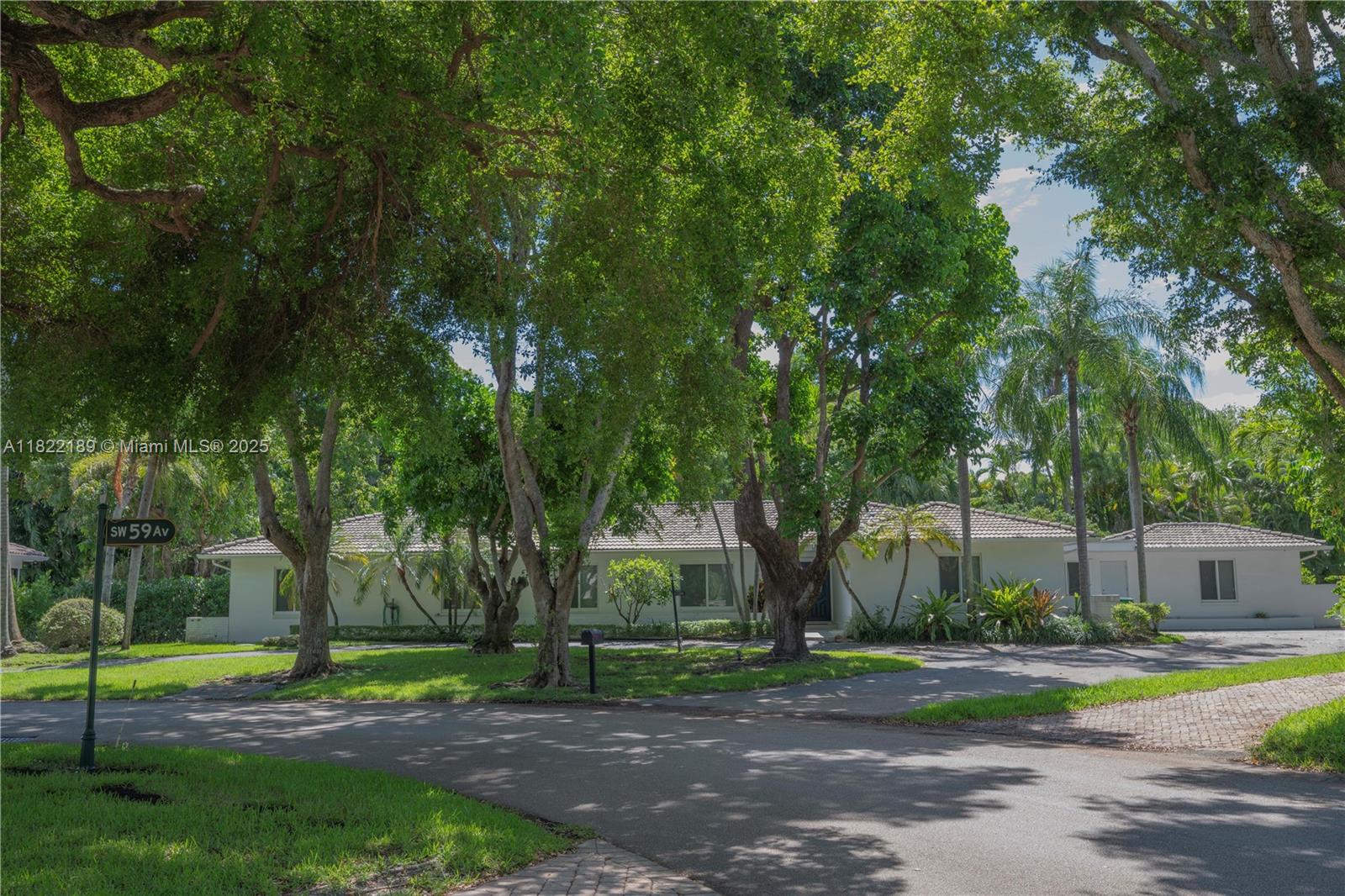 Pristine and beautiful 5-Bed/3-Baths plus Office or Den home nestled on magnificent 22,800 sq. ft. lot in Pinecrest by the Sea, a coveted gated community conveniently located and surrounded by mature tree-lined streets. The convenient floor plan that provides for perfect in-laws quarters or office with separate entrance. Hurricane proof windows. Beautiful neutral floors throughout and updated kitchen and baths. The spacious roofed patio is great for entertainment. One of the biggest lots in Pinecrest by the Sea with spacious backyard and sparkling pool, great ambience to enjoy Miami life style. Pinecrest Elementary School and great private schools. Show with confidence.