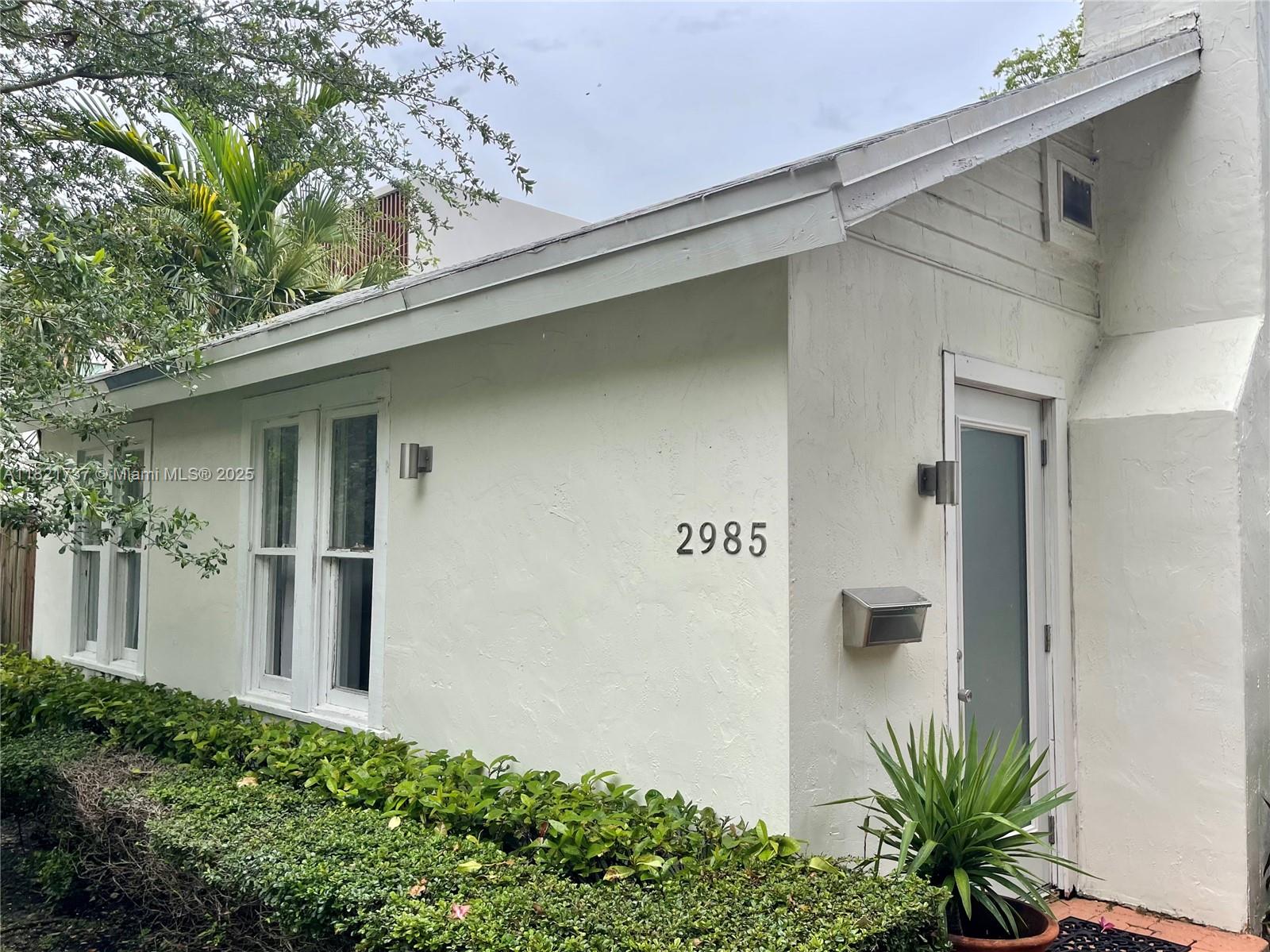 Cozy 2/1 cottage, perfect location! Charming+ a perfect pied- a- terre in the Grove, tucked in between muiti- million dollars  mansions. . Has 2 beds, second room currently being used as an office. . Vintage Coconut Grove home that features , wood floors and a fireplace. Enjoy and just kick back in your easy low maintenance yard - Stroll down to the waterfront and parks, Close to everything grove , restaurants, entertainment. Live the grove lifestyle, Its ready to make your own, live as- is or add on or re- build -Cool urban vibe, location -location. Being sold as land value.