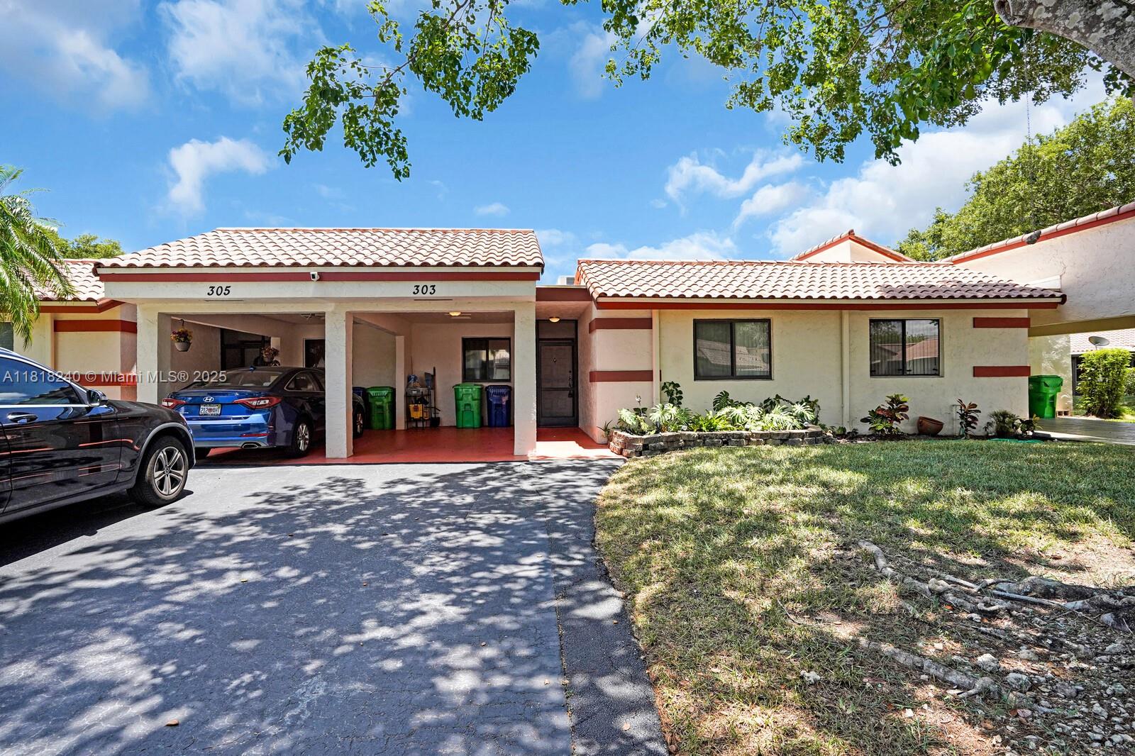303 NW Lakeside Ct, Sunrise, Florida image 1