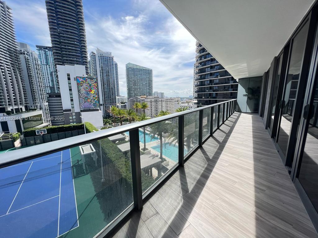 GORGEOUS 2BDR/2.5BATHR + DEN. ITALIAN CABINETS, RAIN SHOWERS. ICONIC AND WORLD-CLASS SLS LUX CONDO. CLOSE TO SHOPPES, BUSINESS, DINING AND ENTERTAINMENT. 10 MINUTES TO SOUTH BEACH, TO MIAMI DESIGN DISTRICT AND WYNWOOD. 15 MINUTES TO MIAMI INTL AIRPORT. PLENTY OF AMENITIES. ROOFTOP. SKY POOL W STUNNING CITY AND WATER VIEWS. SKY BAR ON THE 45 AND 46 FLOOR WITH INDOOR/OUTDOOR LOUNGES. PRIVATE WINE CELLARS. BEACH ENTRY POOL. CABANAS AND SHADED LOUNGE AREAS. JUICE BAR. BBQ AREA W/SUMMER KITCHEN. TENNIS COURT. OUTDOOR THEATER. STATE OF THE ART HEALTH AND WELLNESS CENTER. FULL SERVICE SPA. CARDIO AND WEIGHT TRAINING EQUIPMENT. 3 POOLS. 2 HOT TUBS. POOLSIDE BAR. BBQ AREA. SUMMER KITCHEN. RESTAURANT. KIDS PLAYGROUND. MINI GOLF. POOL TABLE. HOTEL SERVICES. 24/7 CONCIERGE AND VALET.