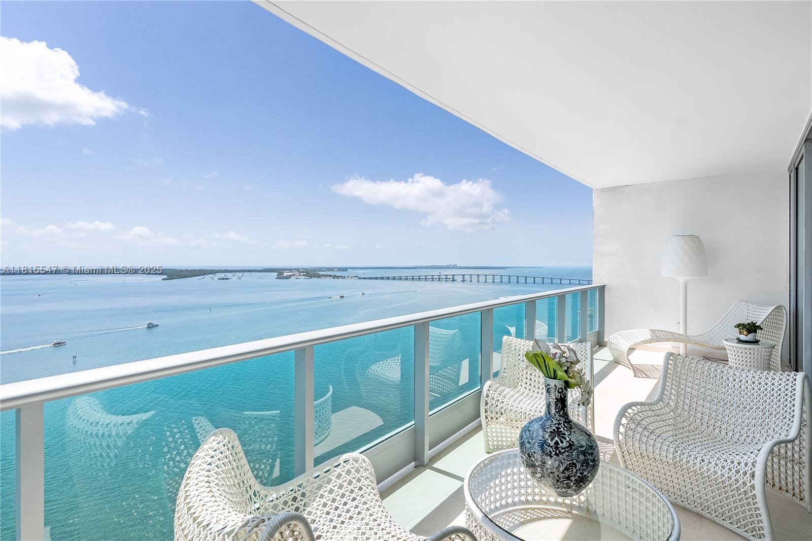 The Ultimate & Stunning Home in the Sky! Breathtaking & Open Biscayne Bay view! Completely renovated with exquisite high-end finishes and magazine-worthy design. Sleek with modern open flair. Luxurious with all the sumptuous comforts. Elegant foyer leads to dramatic living & dining areas. Floor to ceiling decor and impact doors! Gleaming marble floors. Gourmet dream kitchen with top appliances, lavish master suite with state of art closets and spa-like bath! Great split floor plan. Great split floor plan. Magnificient Miami Skyline with panoramic Biscayne bay view! Fabulous and impeccable building amenities with complimentary valet and more! The most luxurious residence with all the sumptuous comforts! Truly a Gem! Show & Sell! See Broker remark for showing appts.