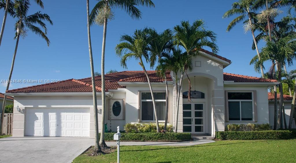 This delightful Freshly Painted 4-bedroom, 3-bathroom 2 car Garage home, located in the renowned gated community of Tuscany Estates centrally located in the middle of Pinecrest/Palmetto Bay area. It features thoughtfully designed layout, including formal living, dining, and family rooms, as well a welcoming eat-in kitchen, it offers a desirable split floor plan a laundry room, large windows, 12-foot ceilings, a spacious master suite with ensuite bathroom and walk-in closet. expansive fenced yard provides ample space for outdoor activities, entertainment, and relaxation. The home has accordions shutters and impact windows, also it features a whole-home standby generator.