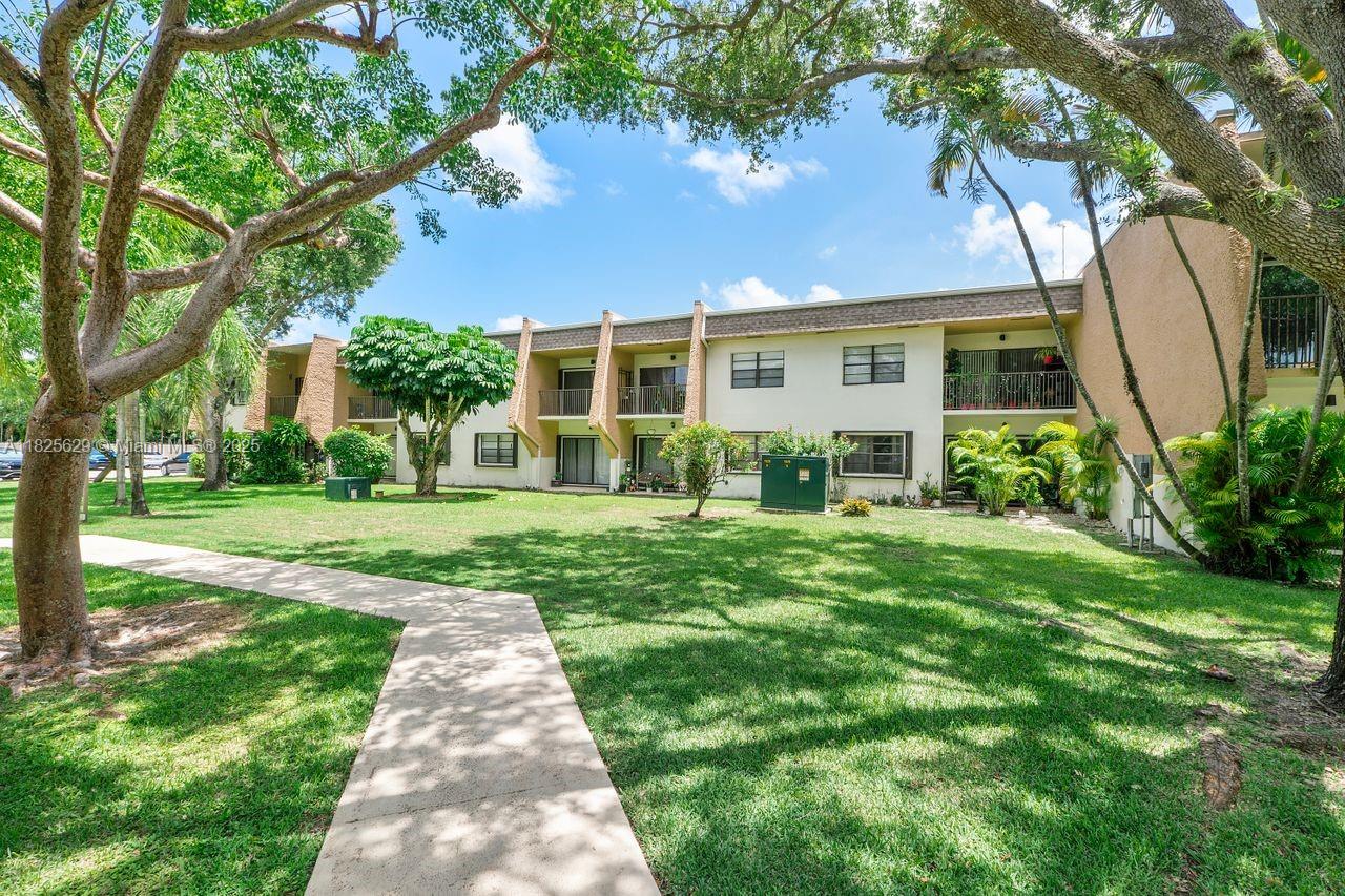 Discover this beautifully updated 2-bedroom, 1.5-bath condo located in the highly sought-after Village of Pinecrest, within the prestigious Palmetto school district. Situated on the second floor, this charming unit features a modern kitchen and bathrooms with wood cabinetry, sleek granite countertops, and stainless steel appliances. Enjoy added protection and peace of mind with storm shutters. The condo offers generous storage space and includes one assigned parking spot. Freshly painted and ready for occupancy.  Perfectly positioned near top-rated schools, shopping centers, dining, grocery stores, and major highways. Complex offers tennis, pool, BBQ, and more. Plenty of guest parking. Association does allow leasing, but does not allow any pets.