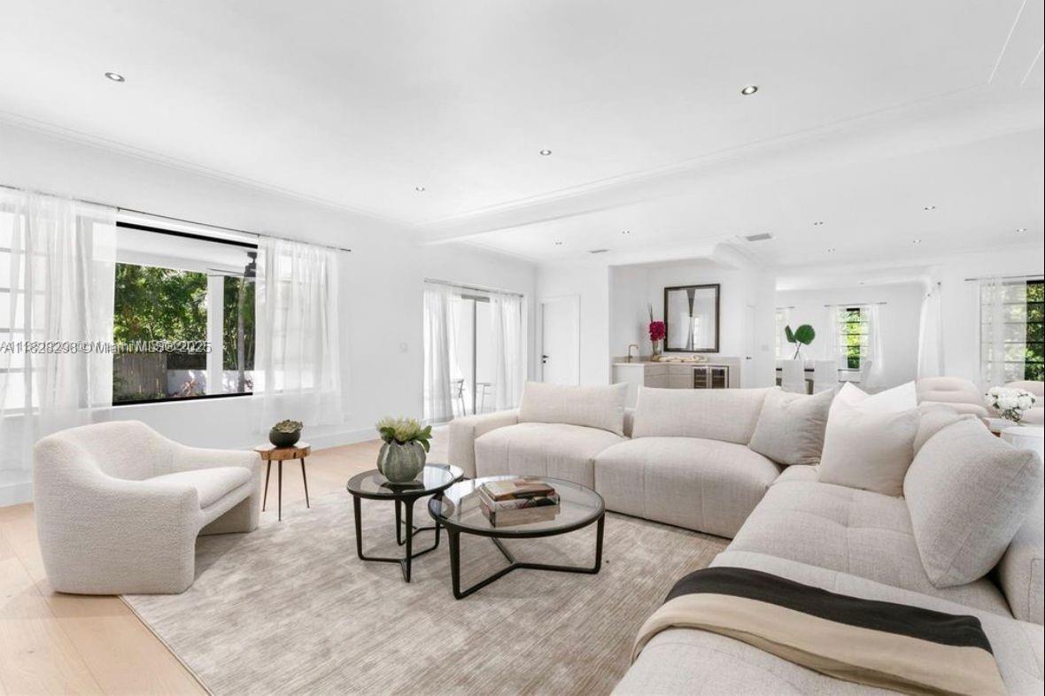 Amazing residence features 5 bedrooms, 4.5 bathrooms, an outdoor pool, and a stylish patio perfect for
entertaining. This newly renovated prime corner lot home spans 10,000 sq. ft. and offers 3,280 sq. ft. of vibrant,
light-filled living space. Highlights include a wet bar with a wine cooler, white oak flooring, and Italian porcelain
tiles with brass fixtures in every bathroom. Natural daylight fills every corner, complemented by premium lighting
fixtures and Italian interior doors with hidden hinges. The fully kosher kitchen boasts Italian cabinetry, high-end
appliances, a Thermador gas cooktop, and Gaggenau ovens. Experience luxury and functionality—make this home
yours today!