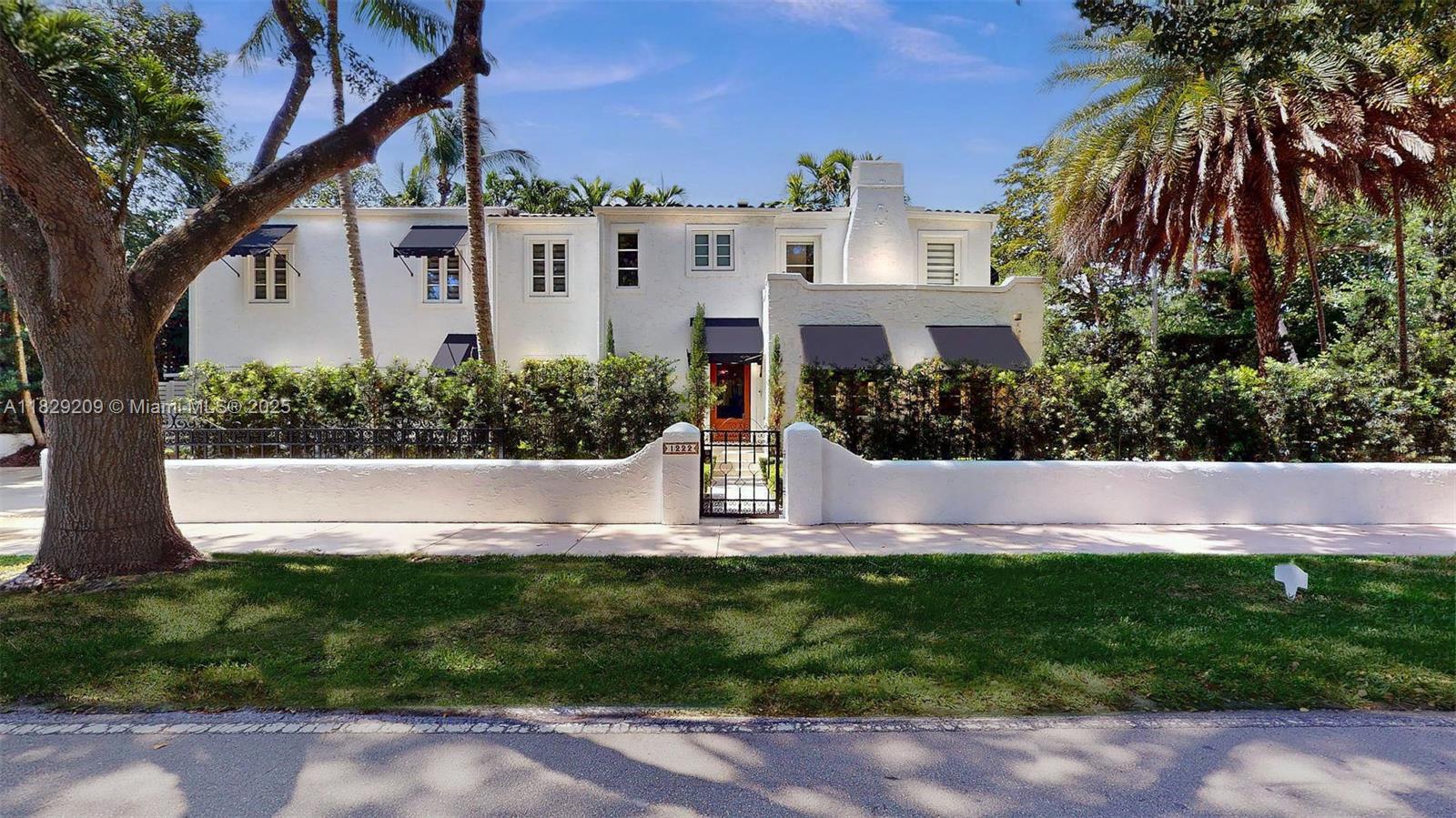 Stunning 1926 classic Spanish home in exclusive Coral Gables perfectly situated near the Granada golf course on quiet tree-lined streets walking distance from Miracle Mile. This custom home was completely remodeled and finished in 2023, without a detail or cost to spare. New roof, electrical, plumbing, air units and ducts, high hats, in roof speaker system on first floor, impact windows and doors, outdoor terrace with coral tiles, landscaping, sprinkler and exterior lighting systems, awnings, all bathrooms and kitchen gutted and redone, beautiful quartz counters, expansive bar and curio for entertaining, custom closets, laundry, garage with custom storage system, refinished hardwood floors, smart home, outside space to entertain, and more.