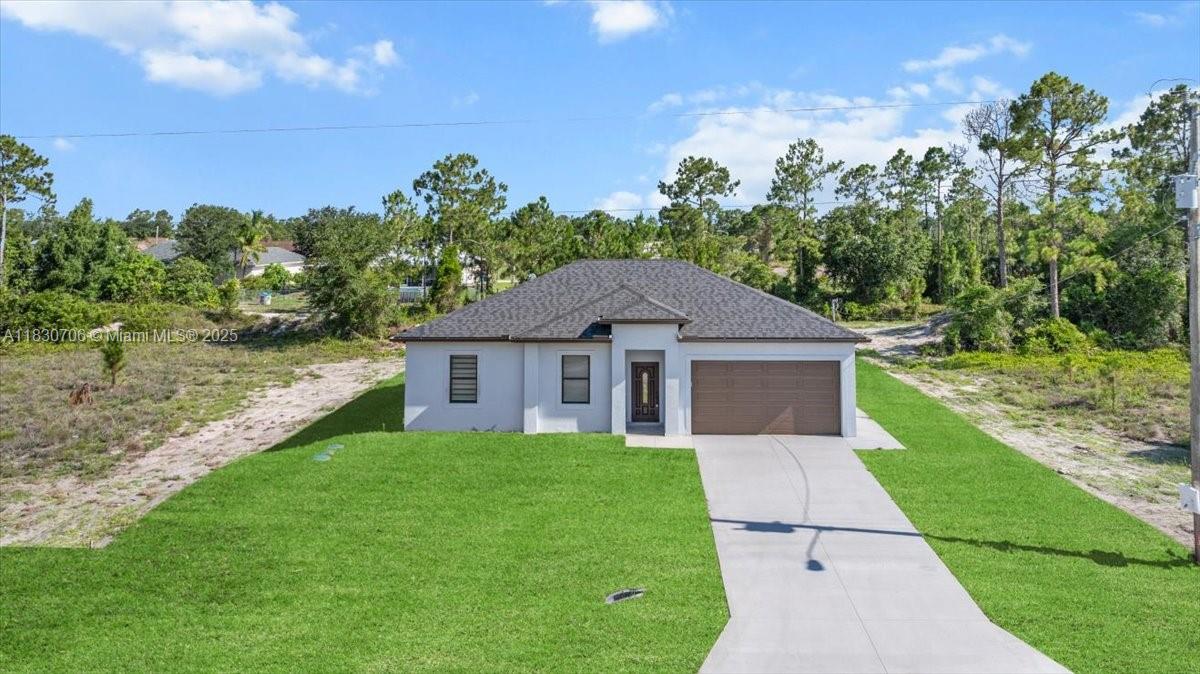 1212 Edelweiss St E, Lehigh Acres, Florida image 2