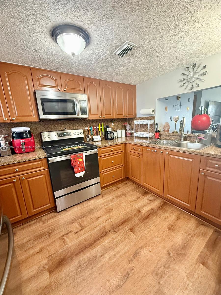 9917 W Okeechobee Rd #3-201, Hialeah Gardens, Florida image 2