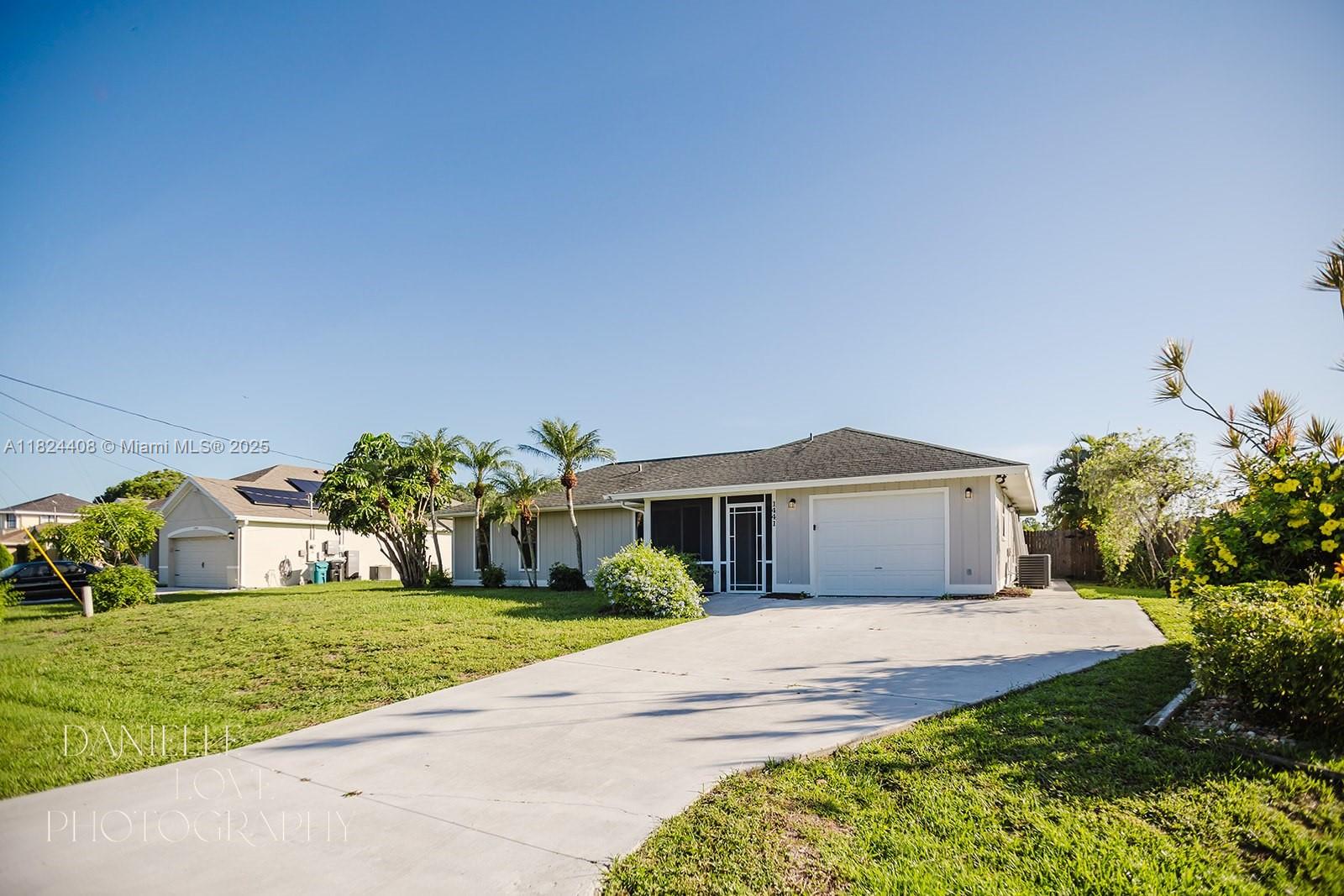 1441 SW Algardi Ln, Port Saint Lucie, Florida image 1