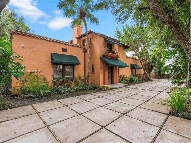 Experience timeless elegance in this historic 1923 Walter De Garmo-designed Mediterranean estate, located on an oversized corner lot across from the Granada Golf Course. "Villa Allegra" offers over 6,000 SF of refined living space with 5 bedrooms, 5.5 baths, and exquisite architectural details throughout. Gated entry, lush courtyards, formal living and dining rooms, a gourmet kitchen, and expansive family spaces make this home ideal for entertaining. The luxurious primary suite features dual baths, custom dressing rooms, and a private office. Enjoy impact windows, mature fruit trees, and serene outdoor living. A true Coral Gables landmark blending sophistication, comfort, and unmatched location.