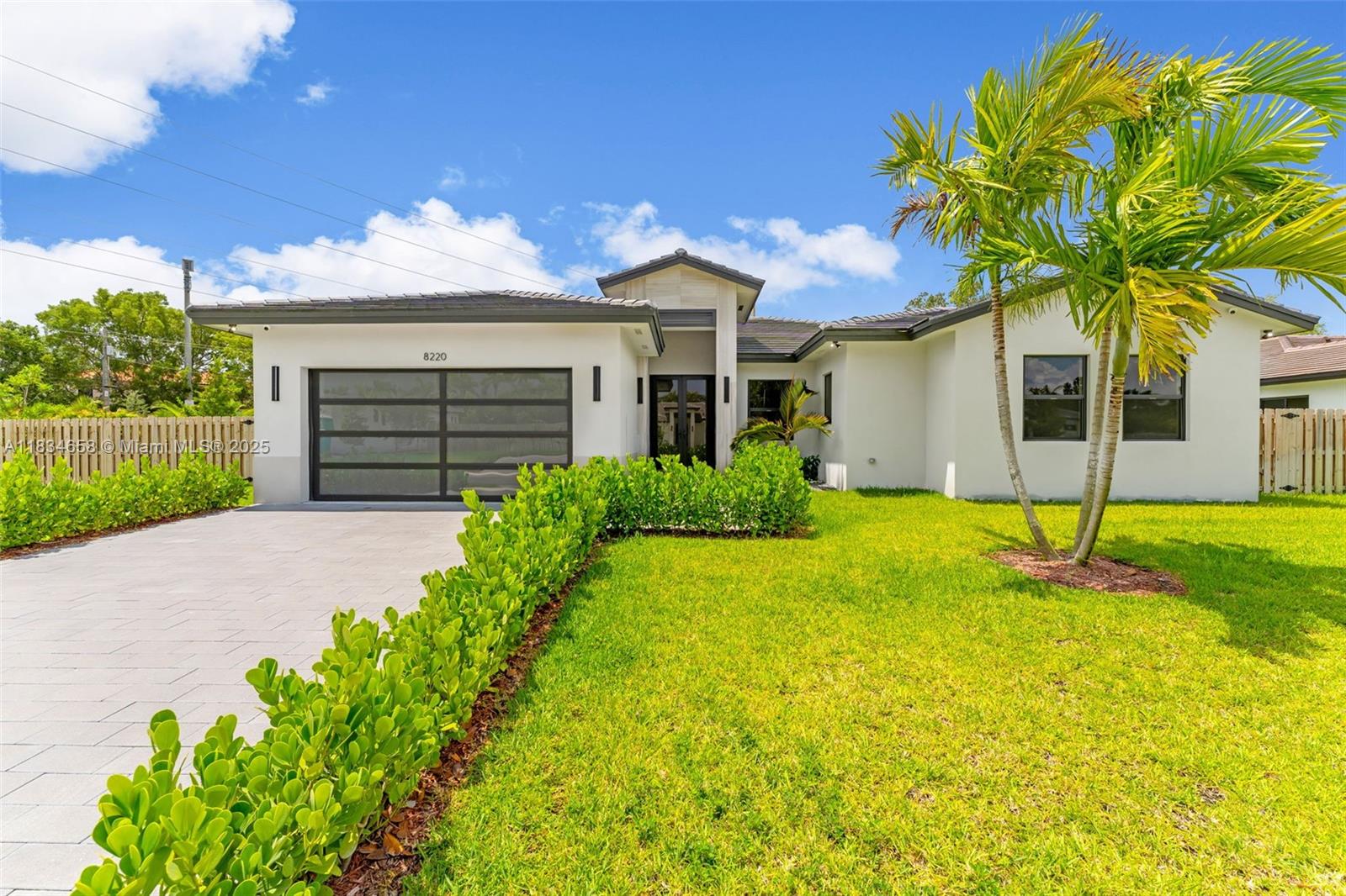New construction luxury home near Deering Estate in prime location off Old Cutler Road, This bright, modern residence features an open-concept layout w/ soaring ceilings & 48x48 imported porcelain floors. The gourmet chefs kitchen is ideal for entertaining, offering wood cabinetry, quartz waterfall countertops, & Bosch S/S appliances w/ wine cooler. Spacious bedrooms w/ built-out closets. Primary features dual walk in closets & bathroom with dual sinks & top of the line finishes. Enjoy seamless indoor-outdoor living with a covered patio & oversized lot. Space for a boat & RV & has plenty of room for pool. Ready for summer kitchen install.  Laundry room, 2 car garage & Smart home w/ surround sound & alarm.Includes 1 year builder’s warranty. No HOA & No CDD. A Curby Corp development!