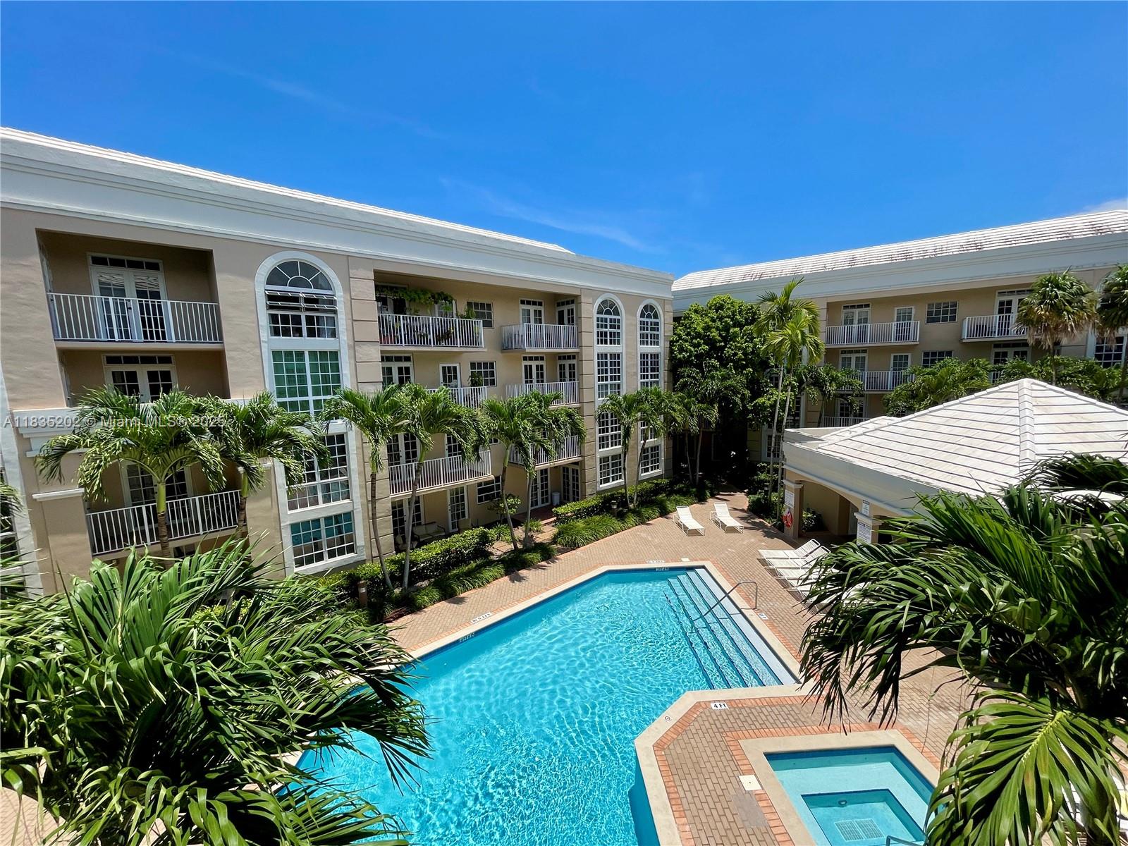 It's all about the U & the BEST VIEW! Located at University Inn Condo, this rarely available 2 bedroom, 2 bathroom residence features a one car garage, washer and dryer in unit and phenomenal views of the pool from every room The updated bathrooms and kitchen with brand new appliances. Enjoy 2 registered parking spaces (1 assigned) and ample free visitor parking. The premium South Gables location offers automatic admission to top rated Sunset Elementary International Magnet Program. The condo is just across the street from the University of Miami and blocks from Miami's Best Pizza, Publix and the wonderful shops and restaurants of South Miami and Gables. The Grove, Miami Intl Airport, world renown beaches are all Miami has to offer Is just minutes away.  Vacant and easy to see.