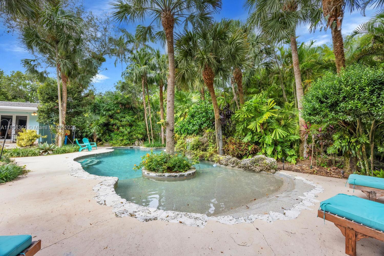 Motivated Sellers! Remodel or Raze on this stunning Tropical Garden Acre (+/-). Currently it features a 1957 house with 4BR+Office+ 3BA+2CGarage with 4,182sf under roof and a charming 2BR+1BA+1CGarage Guest house with 1,794sf under roof built in 2010 with a metal roof, impact doors and windows, and a beautiful Resort-style Pool with beach entry. A conceptual master plan is available to help you create your dream home. This property is loaded with mature and exotic foliage and offers the opportunity for a tennis court. Located in Flood Zone “X” on a beautiful street in South Pinecrest.