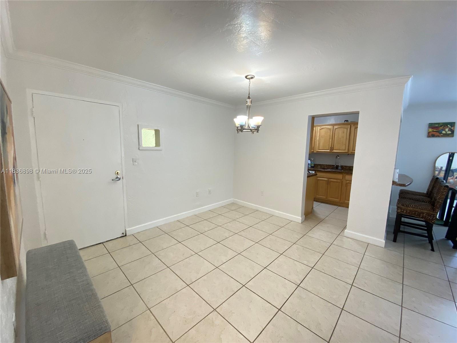 Amazing corner unit in the desired Pinecrest area!..Featuring a super bright & spacious 1/1 on the first floor . Wood cabinetry with granite countertops & eating counter/bar.  Relax in the all fenced patio surrounded by magestic trees. conveniently located steps from all amenities, elevators, Laundry room and parking lot. The Dadeland Grove community is all gated for security & privacy PLUS Management on site. walking distance to worldwide famous DADELAND MALL, Dadeland Downtown & Metro Rail Estation. this one is a TRULLY..LOCATION LOCATION unit!