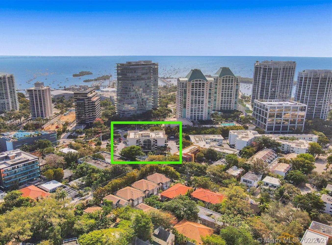 Video available - Rarely available in the building, spacious 2 bedroom unit in the heart of Coconut Grove. Incredible location, walk to Cocowalk, Regatta Park, Kennedy Park, the waterfront. Shops, dining, and bars all steps away. Large corner unit with biggest balcony in the building. Tastefully updated unit, and washer/dryer on the unit floor. Complex is gated and fob entrance with 1 assigned parking space right at the front door, ample guest parking for more spaces. Community pool recently renovated. UNIT is 845 TOTAL SQUARE FEET per in-hand certified appraisal!