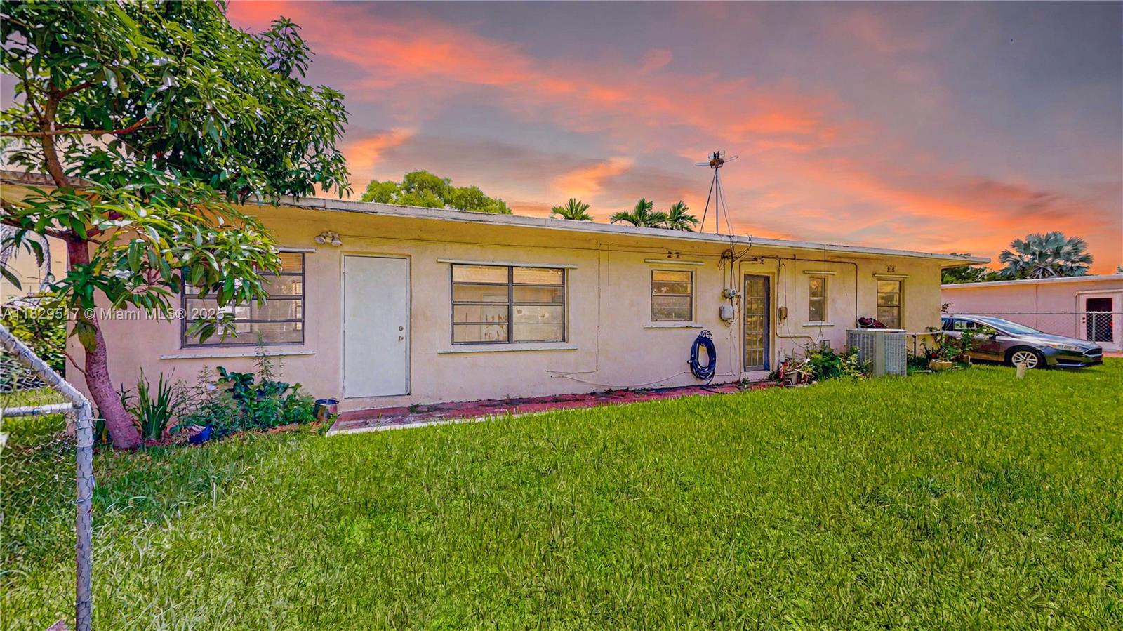 A single-family home with an oversized 8,505 sqft lot is perfect for investors or first-time home buyers. It features 2 bedrooms, 1 bathroom, and 2 spacious Living/Family rooms. The kitchen is functional with stainless steel appliances and plenty of cabinets for storage. Nestled on a fully fenced, oversized lot in the heart of Leisure City and in unincorporated Miami-Dade County. Enough room to build a pool, RV & boat parking. An oversized extra storage room and an extended driveway for multiple car parking. This property offers a lot of possibilities. NO HOA!!! Conveniently located near US 1 and the Turnpike, just minutes from the metro station, Walmart, Southland Mall, Black Point Park and Marina, and gateway to the FL Keys. Enjoy an immersive 3D virtual tour. May the Force be with you!