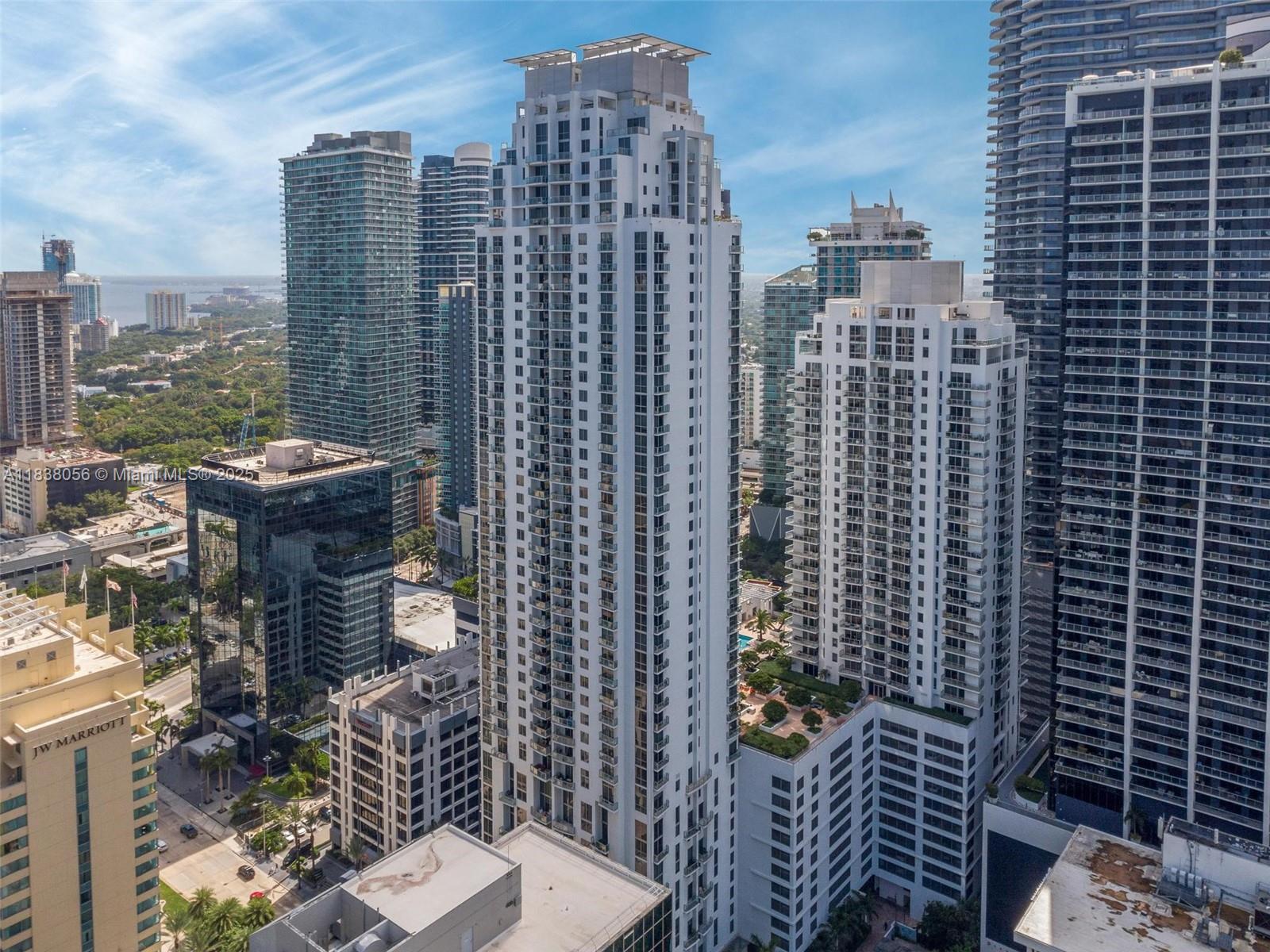 AUCTION SALE - Live in style in this stunning high-floor Brickell loft! This beautifully remodeled 1-bed, 1-bath + half-bath, 1,128sq. A two-level residence on the 24th floor features soaring 20-ft vaulted ceilings, dramatic west-facing sunsets, and floor-to-ceiling windows. The modern chef’s kitchen offers Italian cabinetry, granite countertops, stainless appliances. Full bath upstairs, convenient powder room downstairs. Upgrades include electric shades, sleek wood/ceramic flooring, designer lighting, in-unit laundry, and assigned garage parking. Full-service building with 24hour concierge, valet, gym, pool, spa, and more. Walk to Brickell City Centre, transit, top restaurants, and nightlife. Available exclusively through Hubzu Online Auction. Submit offers on Hubzu.com