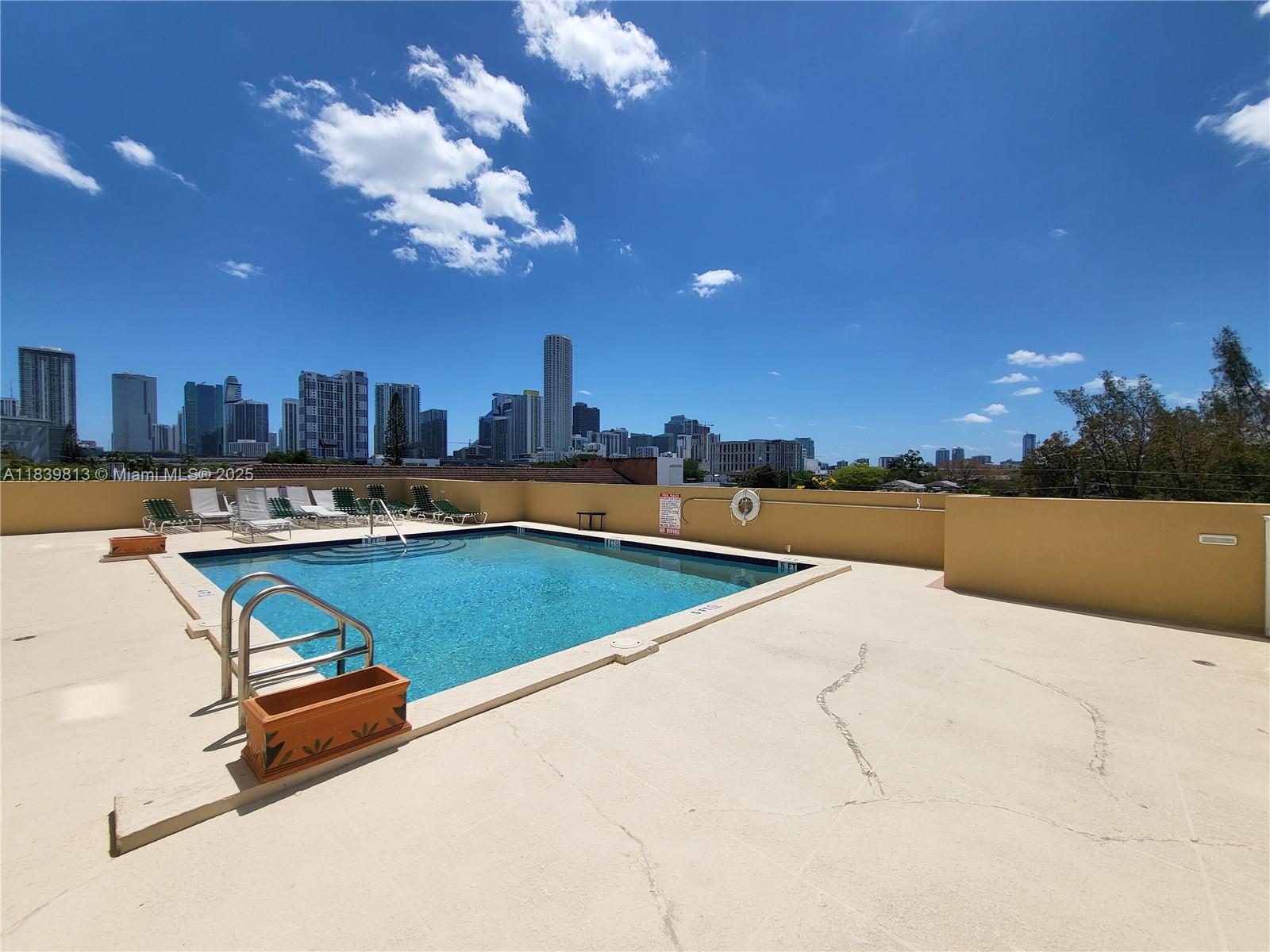 Welcome to Vedado Apartments in the heart of Miami! This stunning 2-bedroom, 2-bathroom unit boasts a spacious layout with tile flooring throughout, a washer and dryer inside unit, a private balcony offering breathtaking views of the iconic Brickell city skyline. With a community pool, gym, and 1 car garage parking space, this condo has everything you need. Located just minutes away from the vibrant Brickell and downtown Miami areas, you'll have easy access to the city's best restaurants, shops, and entertainment venues.