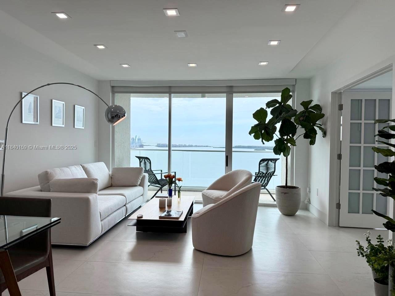 Welcome to your private oasis at the prestigious Brickell Key! this beautiful remodeled, tastefully decorated home offers the perfect blend of modern luxury and serene waterfront living.  With a unique split floor-plan, over 960 sqft 2 beds 2 baths and breathtaking direct views of the vibrant Biscayne Bay. 
Imagine waking up to the gentle sunrise over the water and unwinding with stunning sunsets each evening.  This home provides unparalleled privacy, all while being just moments away from the Vibrant energy of Brickell, minutes to Miami airport and beaches.