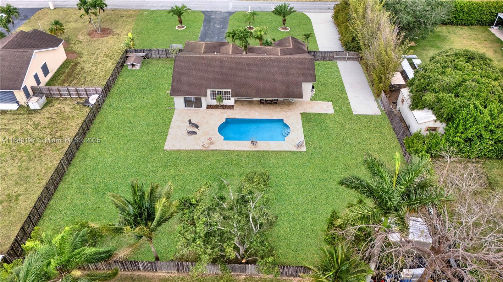 Beautiful one story home in the desirable neighborhood of “Redland’s Best”. Sits on a 1/2 acre lot with a large pool that has a travertine floor deck surrounding it. Plenty of space for boats and RV’s on both sides, front and back. The property has a fenced in section with a dog house, mango, avocado trees and a storage shed that will stay. Split floor plan with master on one side and the rest of the bedrooms on the other side (easy to split the house for those needing in-law-quarters or efficiency). Spacious kitchen and tiled floor throughout. Offering the ultimate in indoor-outdoor living. Paved driveways on both sides and a double car garage. No HOA nor CDD. Freshly painted on all of the outside.