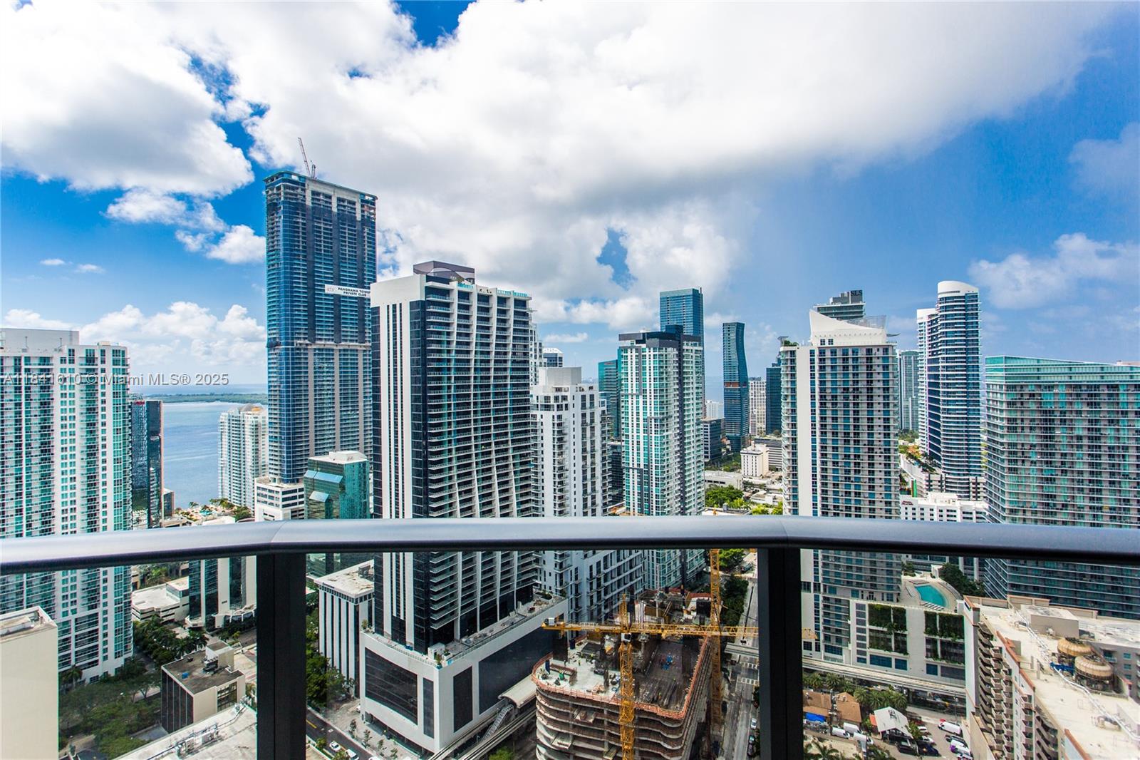 Own in the heart of Brickell. Enjoy a spectacular view with expansive wraparound balcony minutes from amazing shopping, dining, and more! This 2 bedrooms/2.5 bathrooms plus den with resort style amenities features finishes such as porcelain flooring throughout, top of the line appliances, Italian cabinetry and 1 assigned parking space. Amenities include roof top pool, business center, club rooms, game room, theaters, children's room, spa with sauna, steam room and hot tub. Live above the buildings in this high floor premium 2 bedroom residence.