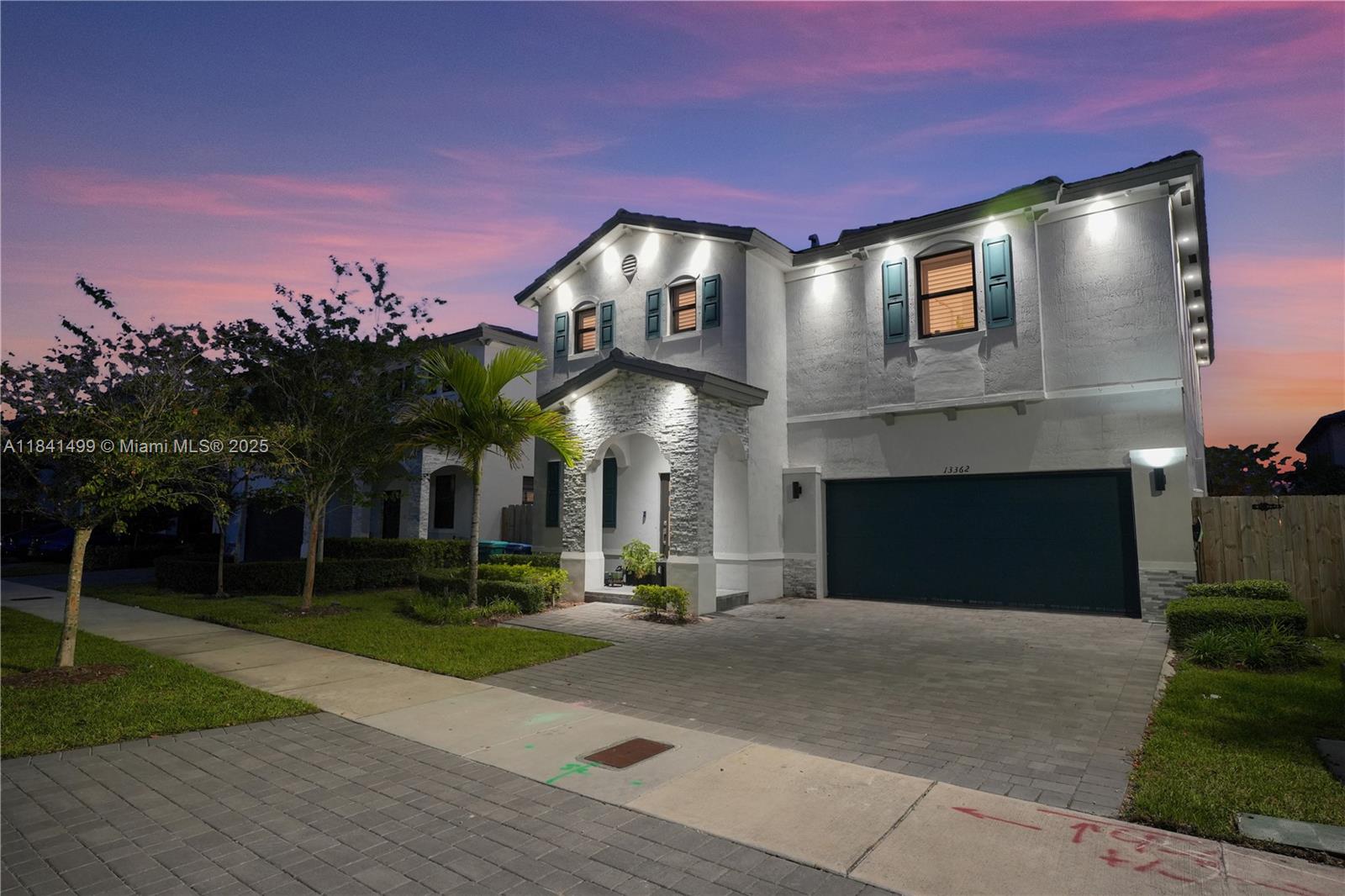 Step into this stunning 2-story home built in 2022, offering 5 bedrooms and 3 bathrooms, with one bedroom located on the first floor, perfect for guests or multi-generational living.
Enjoy peace of mind with all impact windows, a beautiful decorative front door, and modern finishes including plantation shutters and quartz countertops. The home is brilliantly lit with 70+ interior and exterior LED lights and lights, creating a bright and welcoming atmosphere.

Outside, the home is equipped with a smart irrigation system and a surveillance camera system with DVR for added security and wood fence! The primary bedroom has a custom built-in closet for style and function. 

This home truly offers everything you've been dreaming of style, security, comfort, and convenience all in one place.