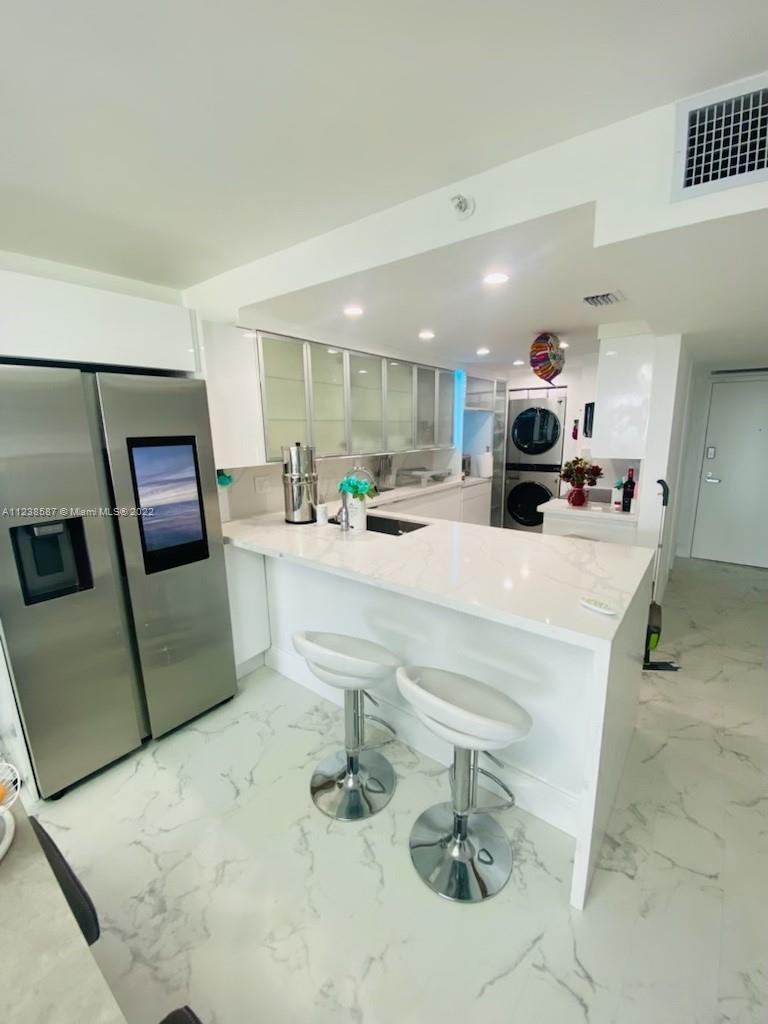 Entrance and open kitchen view from living room