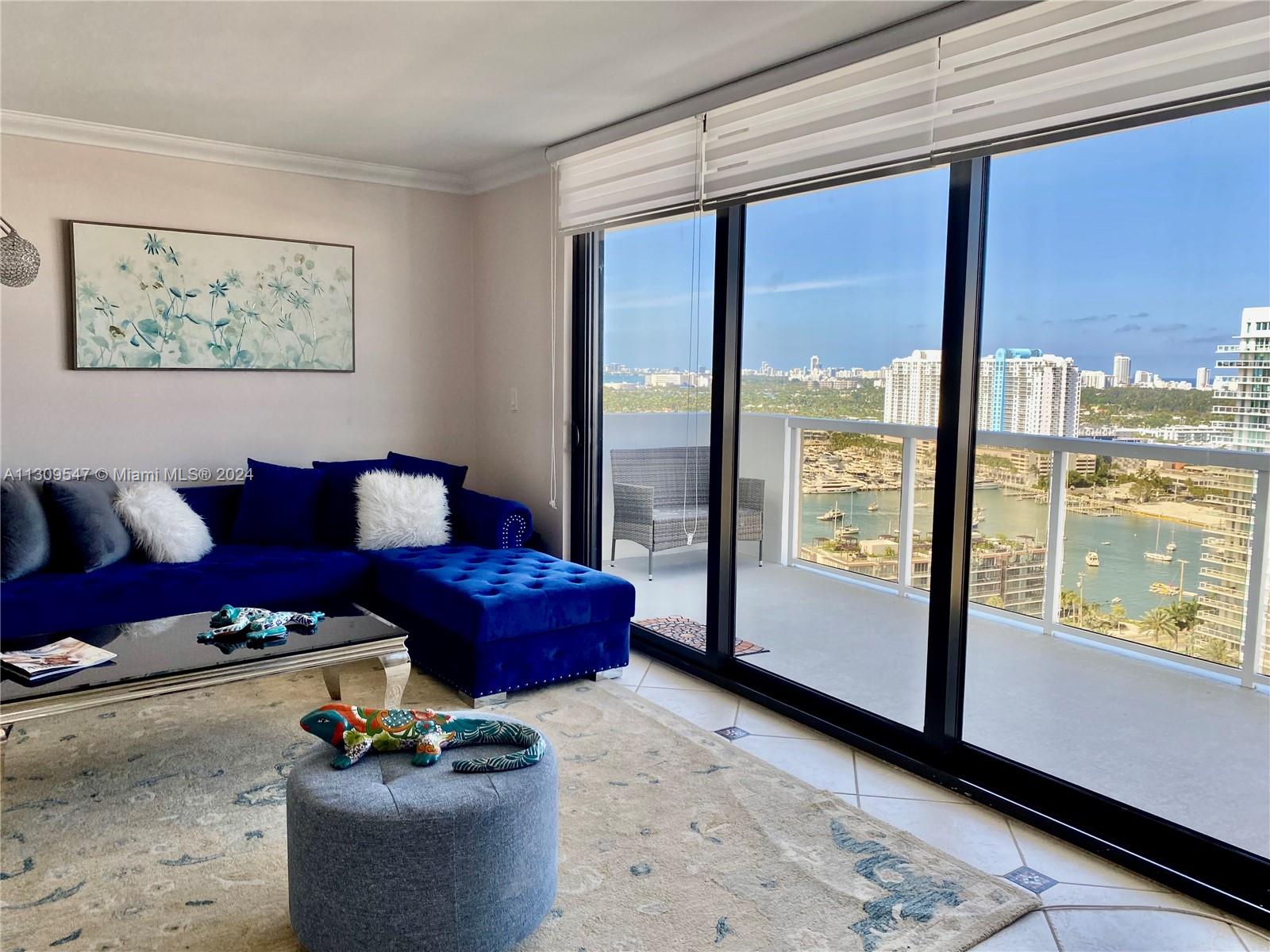 Gorgeous furnished unit with side views to the bay. Close to restaurants, shopping centers and Lincoln Road Mall.
Enjoy all the amenities you expect for today's living.(Pool, sauna, BBQ area, gym ) Security and valet. 
Impact windows has been installed recently.