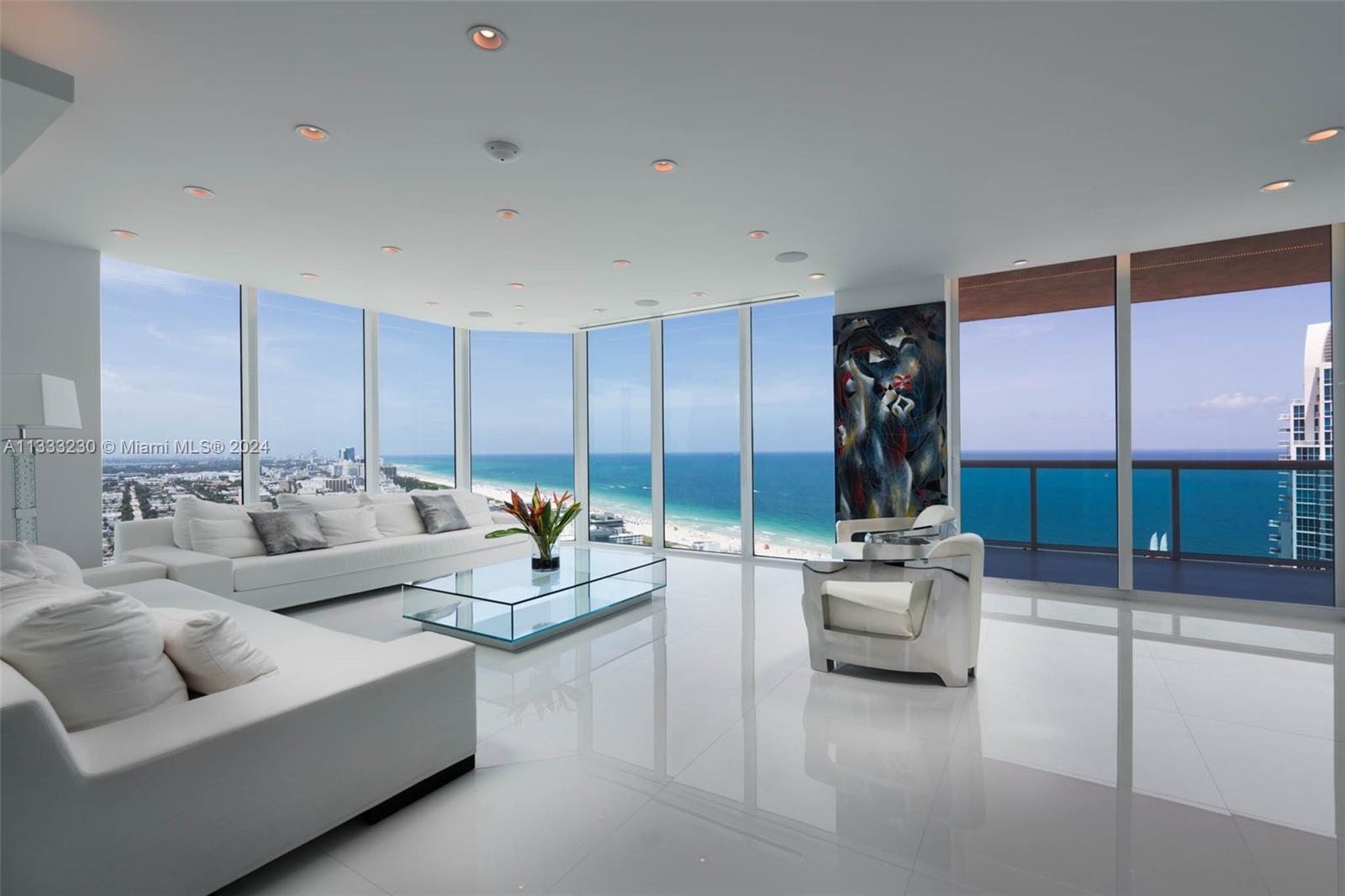 Large 4,723 sq ft.  Rare double unit with panoramic views of beach, ocean, bay, Miami skyline and cruise ships, South Pointe Park.    Dual elevators open into private art gallery entrance.  Perfect for large family and entertaining.  2 large primary bedroom suites. (4BR).  Renovated 2013. Enjoy South of Fifth lifestyle at its finest!