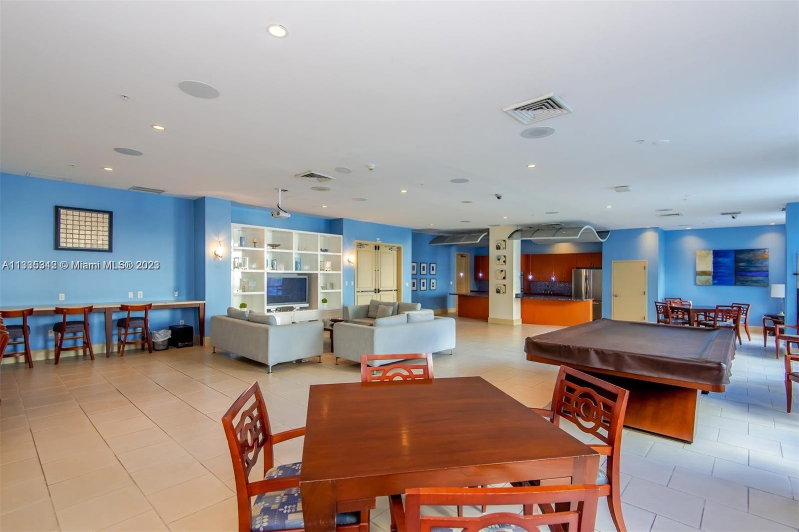 Clubroom with kitchen, TV pool table.