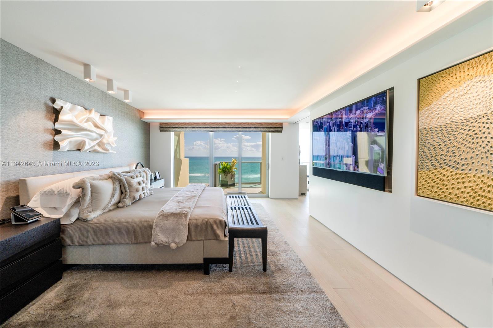 Spacious primary suite with endless ocean views & balcony access!