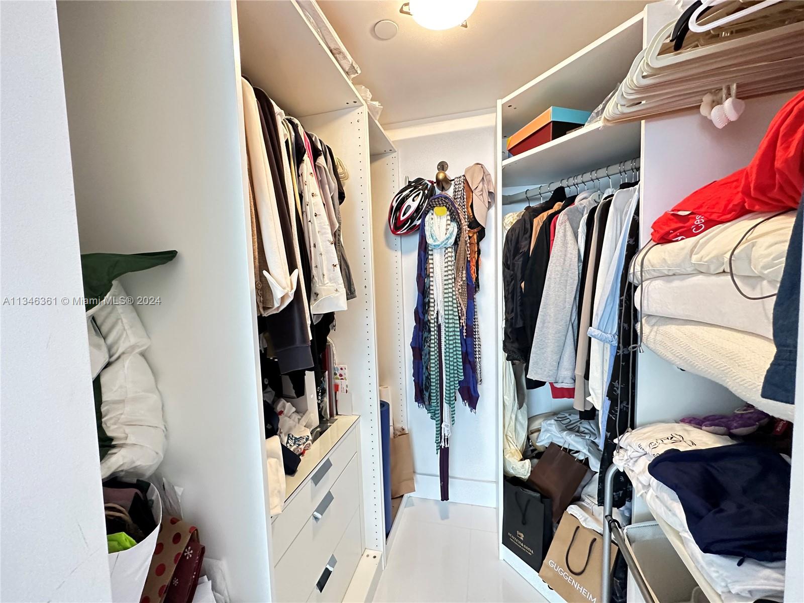 in Bedroom entrance to 1 wall closet, and bathroom next walk in closet.