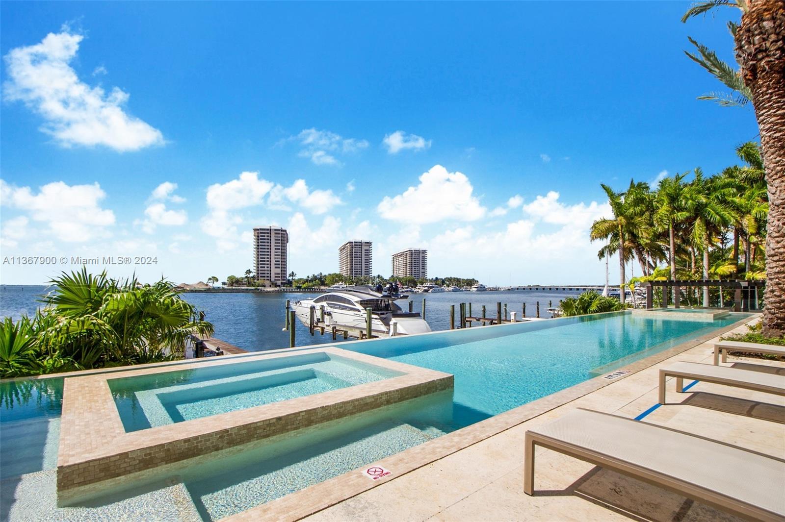 Welcome inside this Waterfront  2-sory apartment boasting 3 beds, 5 ½ bath + den, located in Coconut Grove inside the private Residences of Vizcaya. Spanning 4000 sf, this breezy unit offers an expansive 700 sf covered terrace with unobstructed views of Biscayne Bay, idyllic for entertaining with room for a jacuzzi, barbeque, al fresco dining and wraparound sofa. Featuring direct access to a spacious dining and living room with built-in bar, residents can enjoy a light-filled open floor plan decorated with a vibrant palette and high ceilings, leading into a gourmet chef’s kitchen with custom appliances. Large spa-inspired baths make for optimal luxury. Additional features: Dock for drop-off/Pickup, 4 parking spaces, 24-hour security and close proximity to award-winning schools.