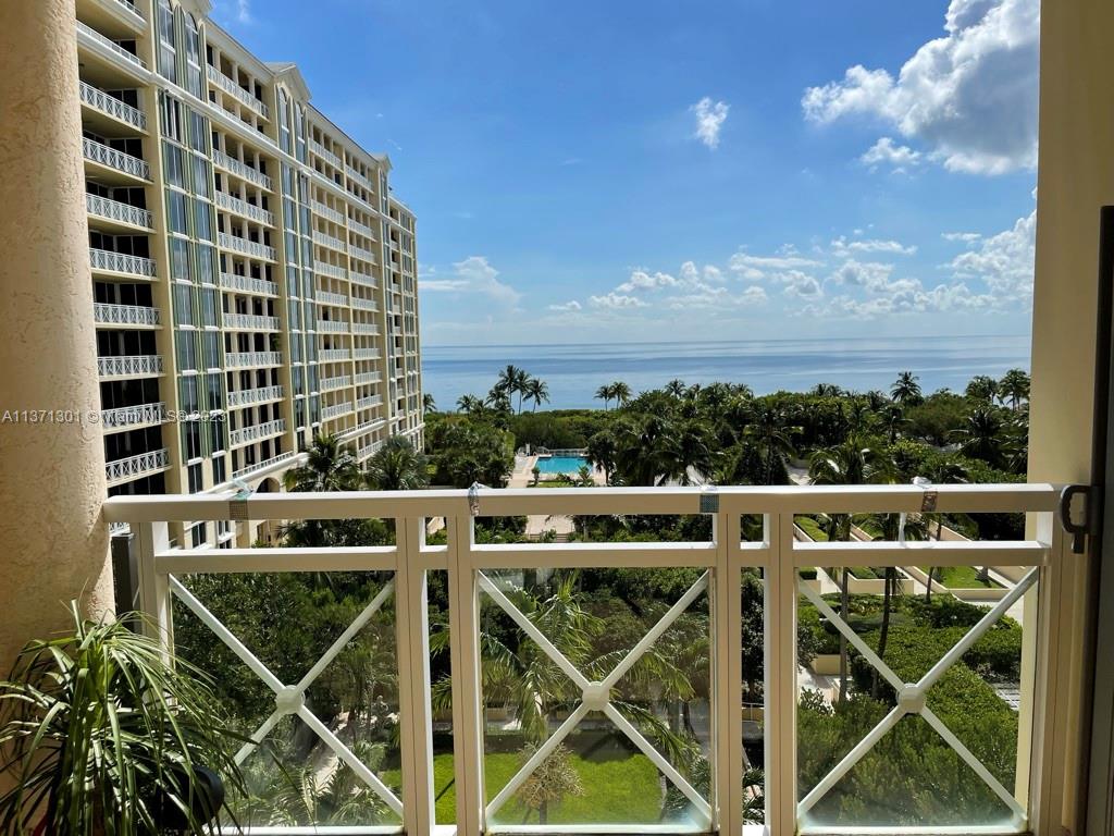 Exquisitely, fully remodeled by its current owners (may 2022), 3 bedroom plus den and 4.5 bath, 7th floor apartment at the Grand Bay. Step off your private elevator and into an elegant foyer to discover a frontal 180 degree ocean view with top of the line finishes. Enjoy a spacious living room, formal dining room, kitchen and living room areas with access to a L-shape balcony overview the ocean. Fully remodeled laundry room with private service entrance. Comes with 1 assigned parking spot and free valet parking. Resort style of living with the Ritz Carlton amenities next door, or the Grand Bay exclusive beach access where resident beach lounge chairs and umbrellas dot the finest stretch of sand in Key Biscayne, all within the most family friendly and safest community in all of Miami.