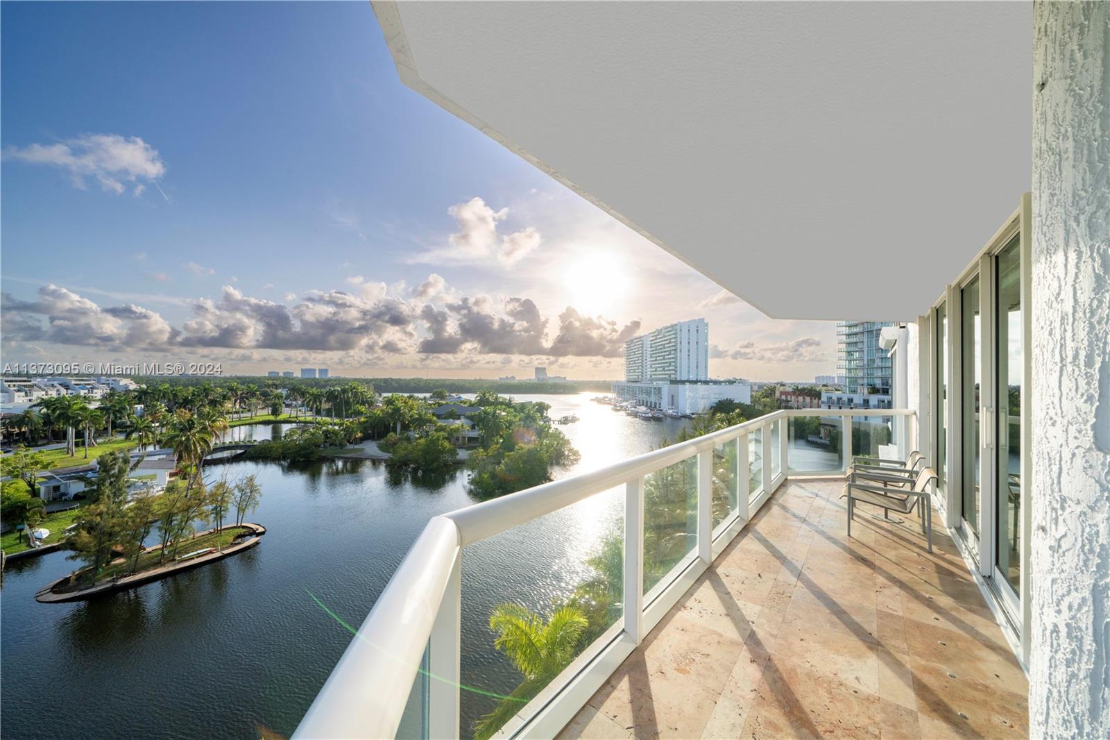 Best price per SqFt in Oceania V! Rare & spacious 3BD/3.5BA townhouse in the sky on Oceania Island boasts ocean, intracoastal, park & lagoon views. Elevator foyer entry from both floors, large living/dining room, chefs kitchen, flowing den/media room/home office w/kitchenette, 2 primary suites plus 3rd ensuite bedrm, all connected by a stunning private circular staircase. Turkish travertine floors, new impact windows, electric shades, custom cabinetry, powder room, laundry room/pantry & ample closet space. Well managed, secure & quiet waterfront building w/front desk concierge. PRIVATE BEACH ACCESS ON COLLINS. BEACH, TENNIS, SQUASH, RESTAURANTS & SPA ARE AMONGST MANY AMENITIES. Walk to Haulover Beach! 2 deeded covered parking & 2 storage lockers. Funded reserves & no current assessments.