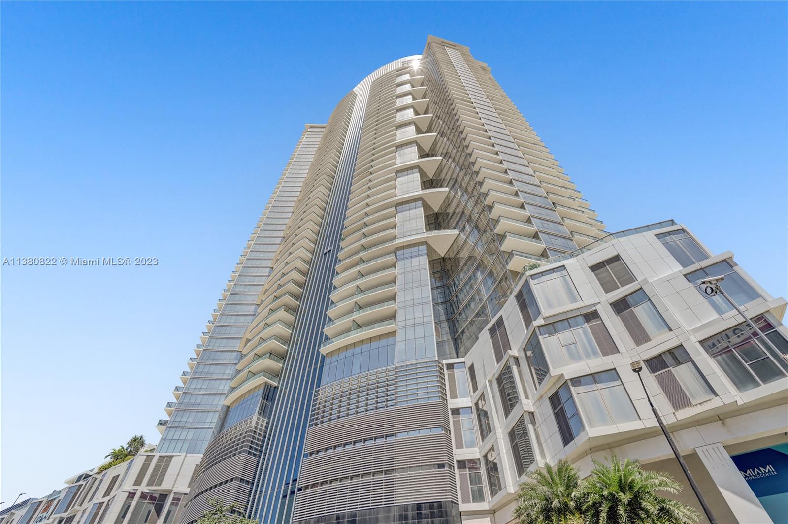 Exciting opportunity! This furnished 1-bedroom + den unit in Paramount World Center is a gem. It boasts white tile floors, 10 ft ceilings, a den/office, Bosch appliances, quartz countertops, Italian cabinets, and a custom-built kitchen pantry. Located in Miami Worldcenter, it offers an array of amenities including 5 pools, a spa, outdoor lounge, summer kitchen, game room, fitness center, boxing studio, basketball court, racquetball, yoga, observatory, jam room, recording studio, and more! Don't miss out on this luxurious living experience.