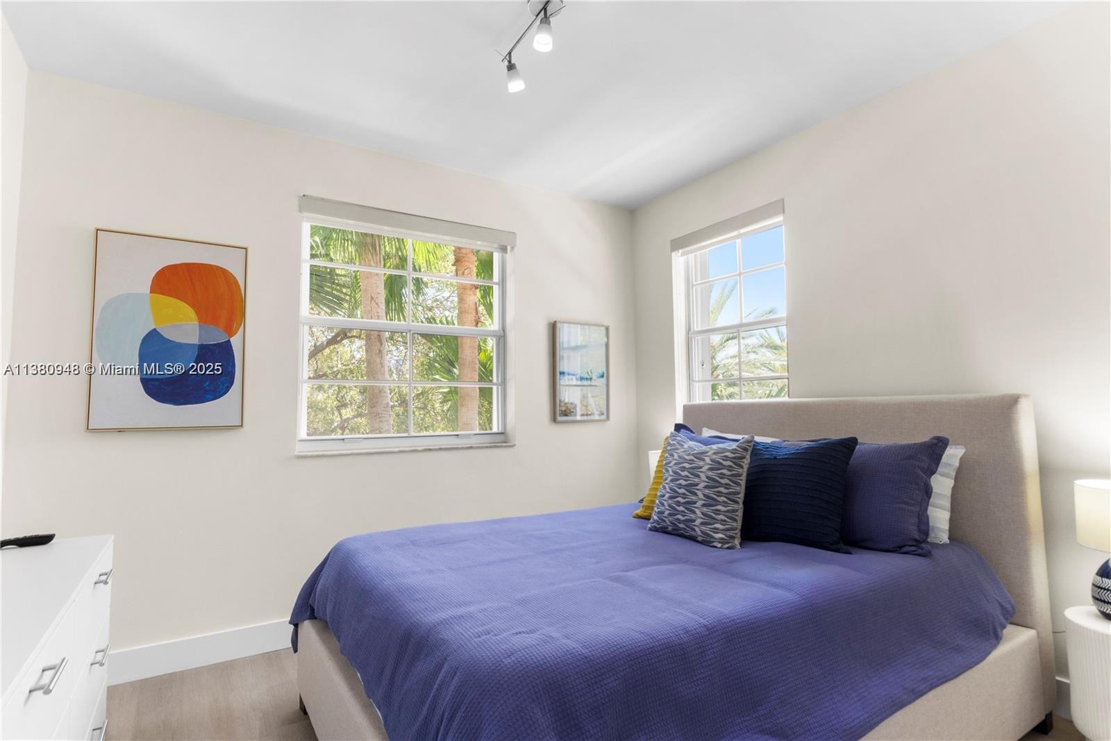 2nd bedroom closet equipped with beach chairs, beach umbrella, beach cart, beach towels