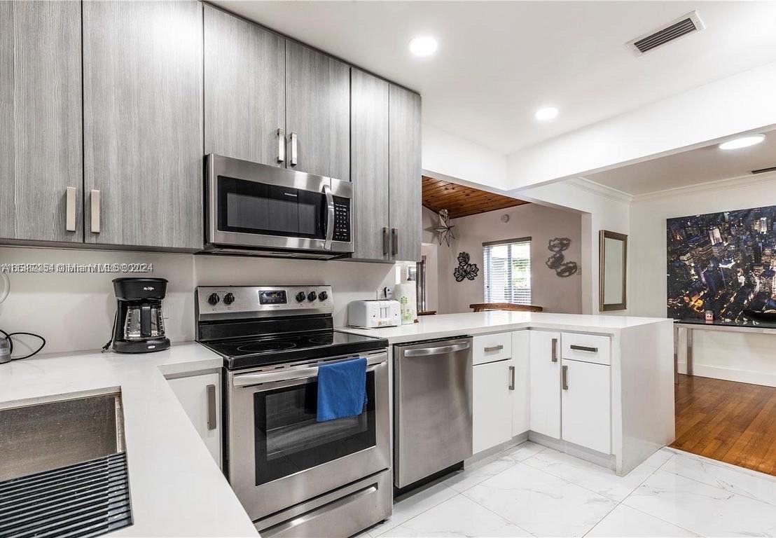 Hallway leading to kitchen