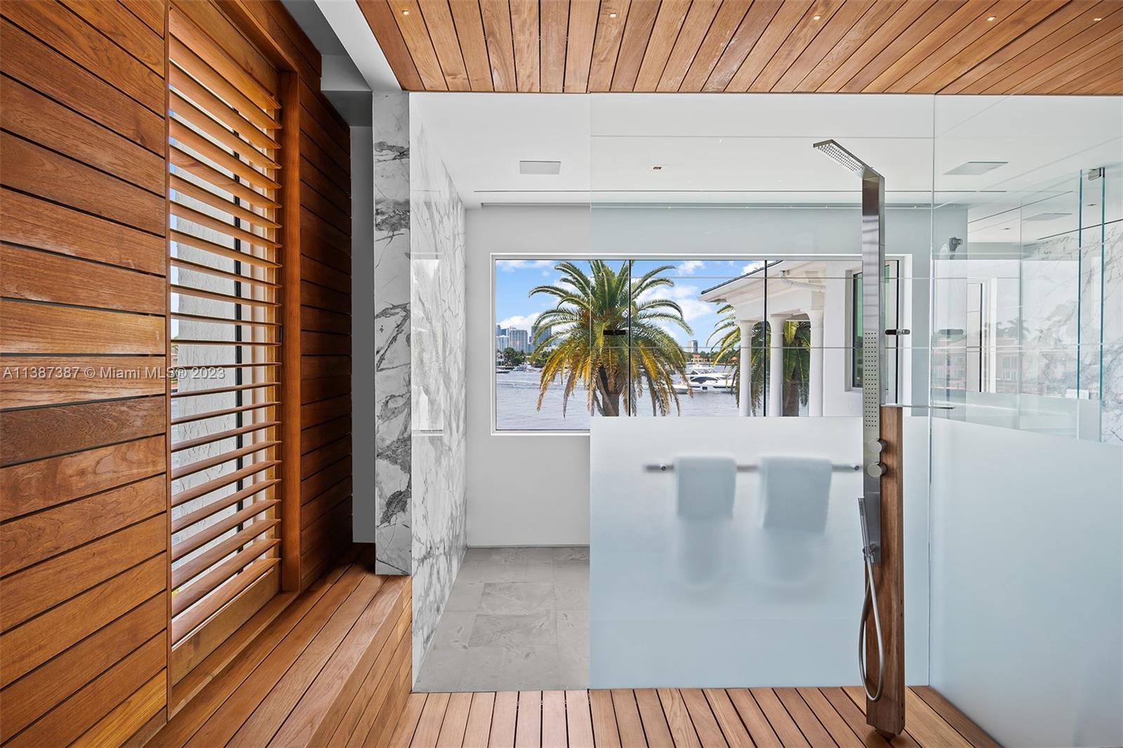 View from the Shower looking West.  Electric blinds for privacy as desired.