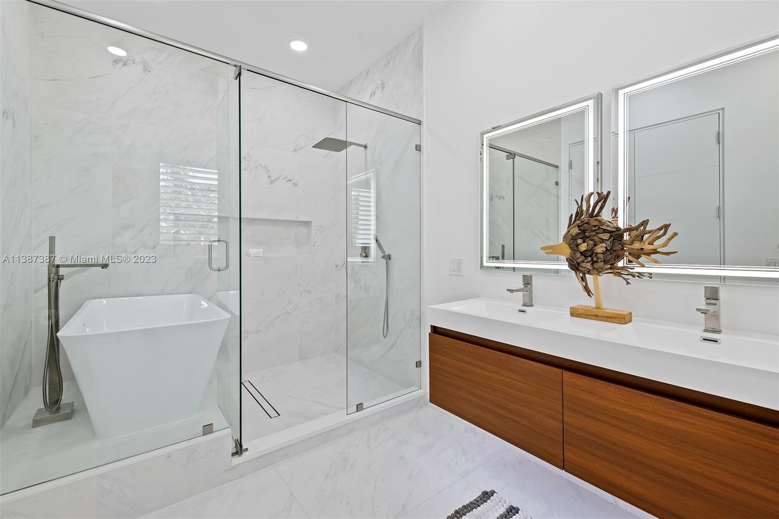 Tub room with Shower in bathroom attached to bedroom in Children's wing.