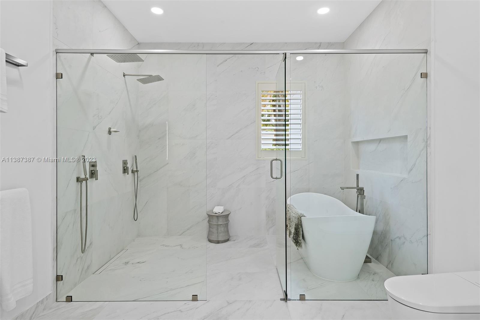 Shower and Tub room attached to the VIP Suite.  There is also a Laundry unit in a room next to the bathroom so guests can do their laundry in private.